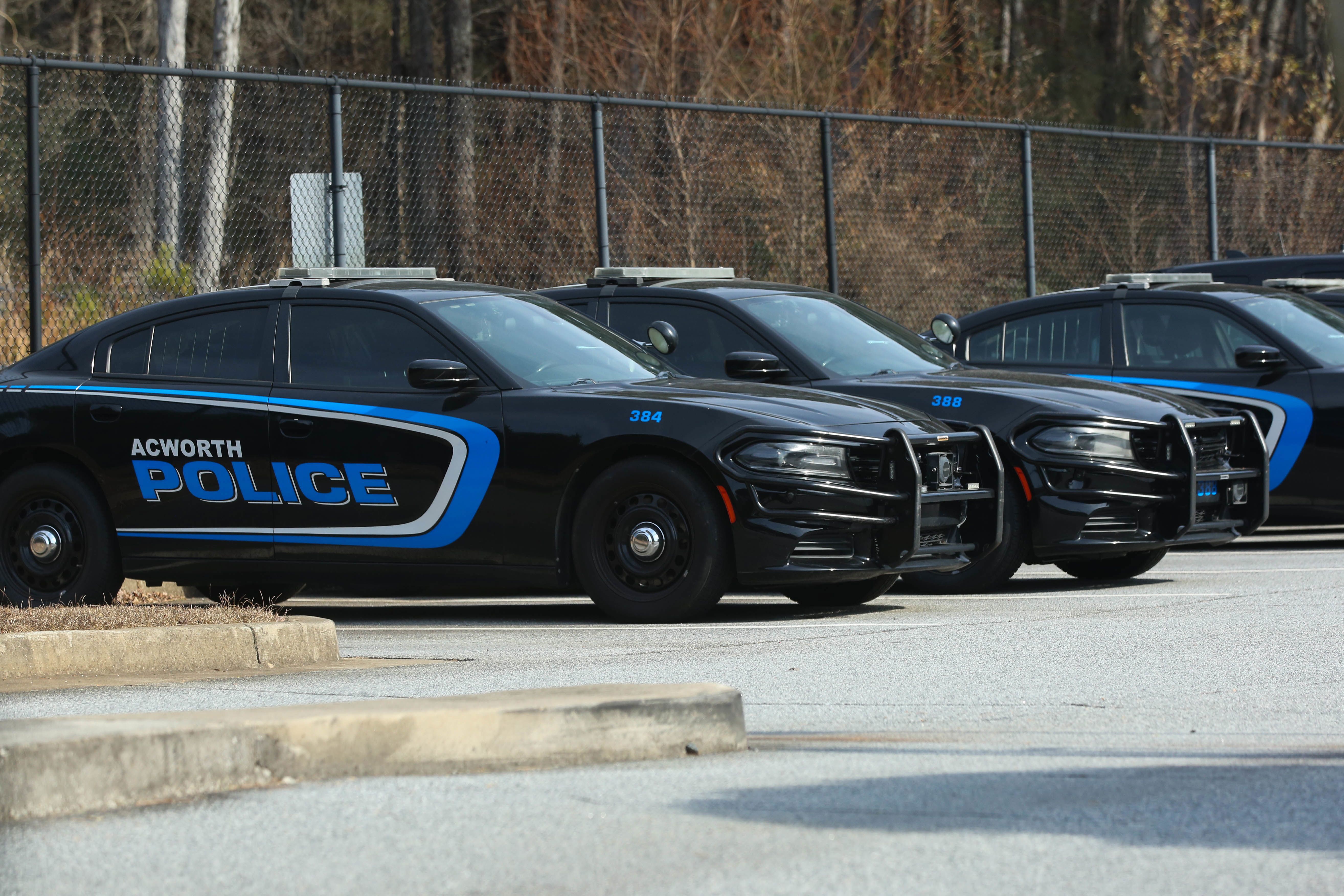 Acworth Police cruisers are seen in Acworth, Georgia, on December 17, 2025.