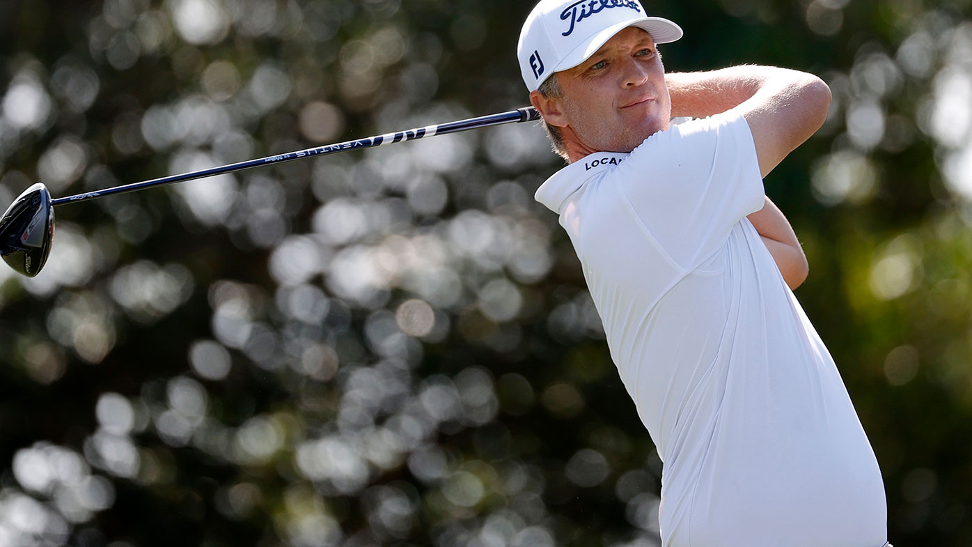 Matt Jones of Australia plays his shot from the 14th tee during the first round of The Honda Classic.