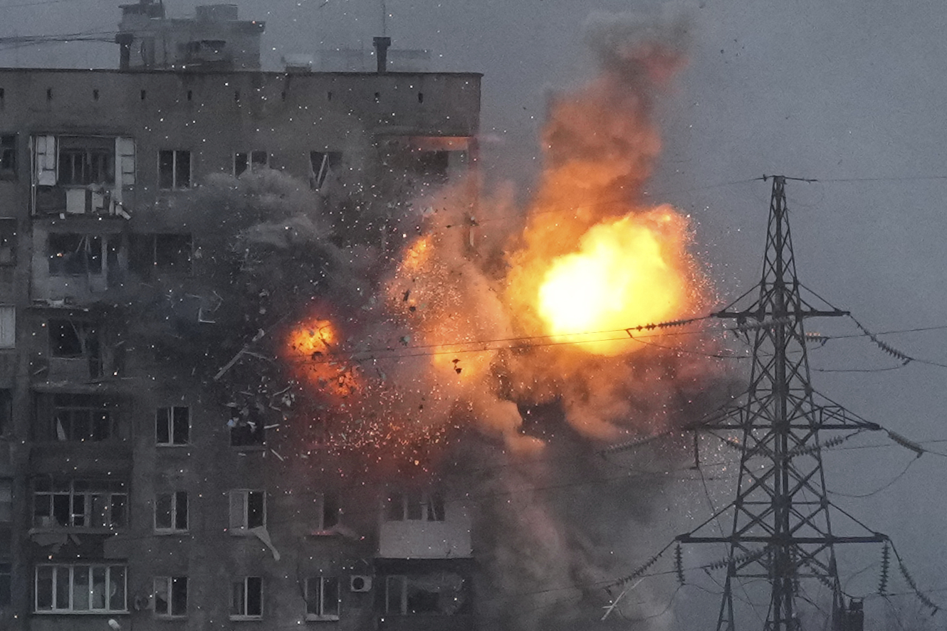 An explosion in an apartment building that came under fire from a Russian army tank in Mariupol, Ukraine, with the city being left without water, gas and electricity among the Russian attack. 