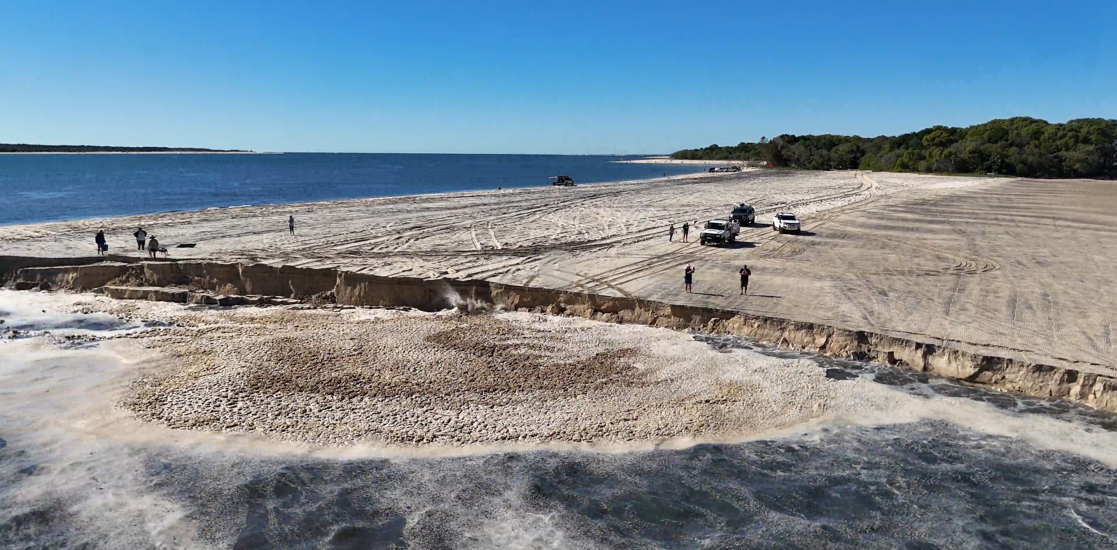 A sinkhole has opened up at Inskip Point north of Rainbow Beach in Queensland. 
