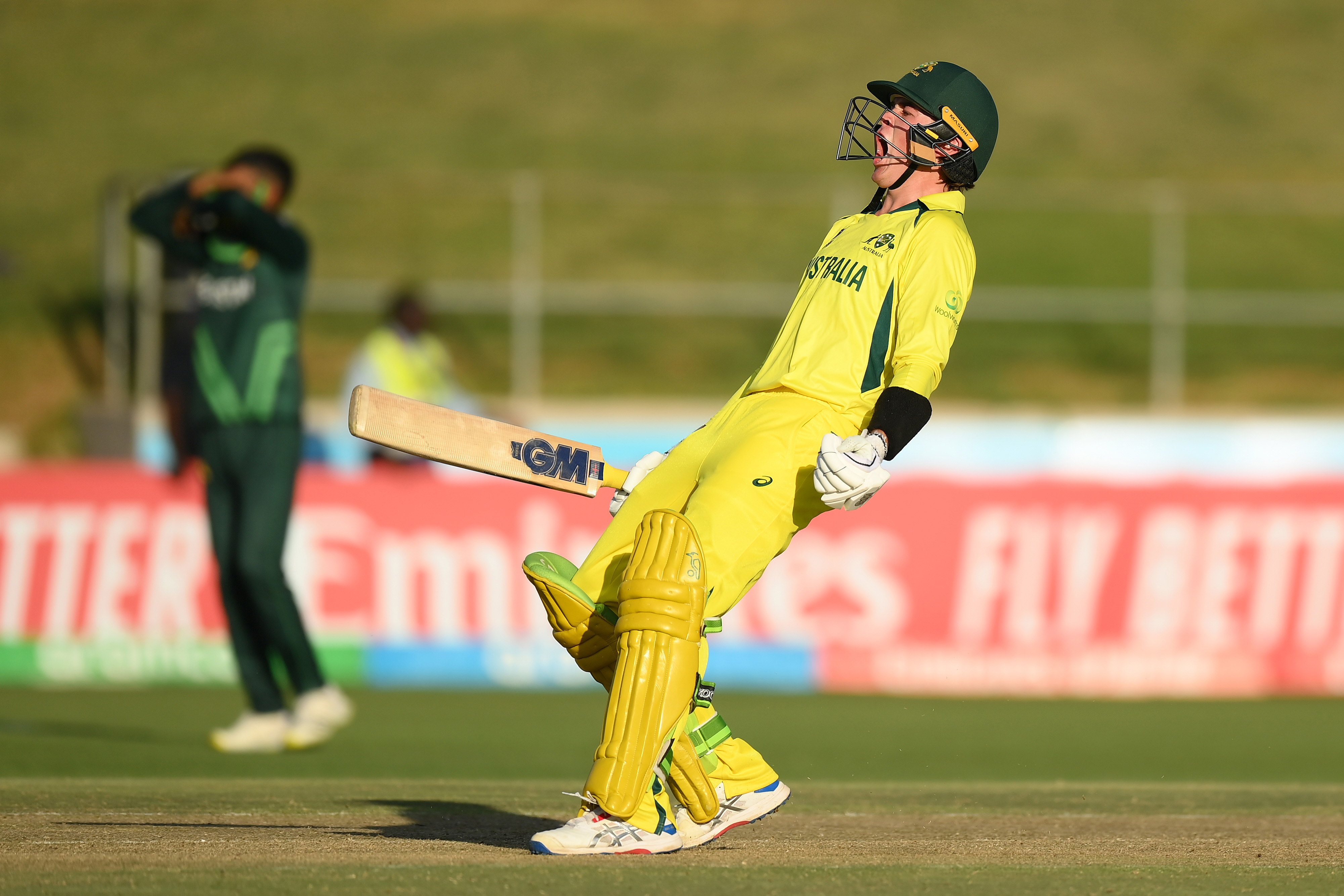Rafael MacMillan of Australia celebrates following the ICC U19 Men's Cricket World Cup semi final.