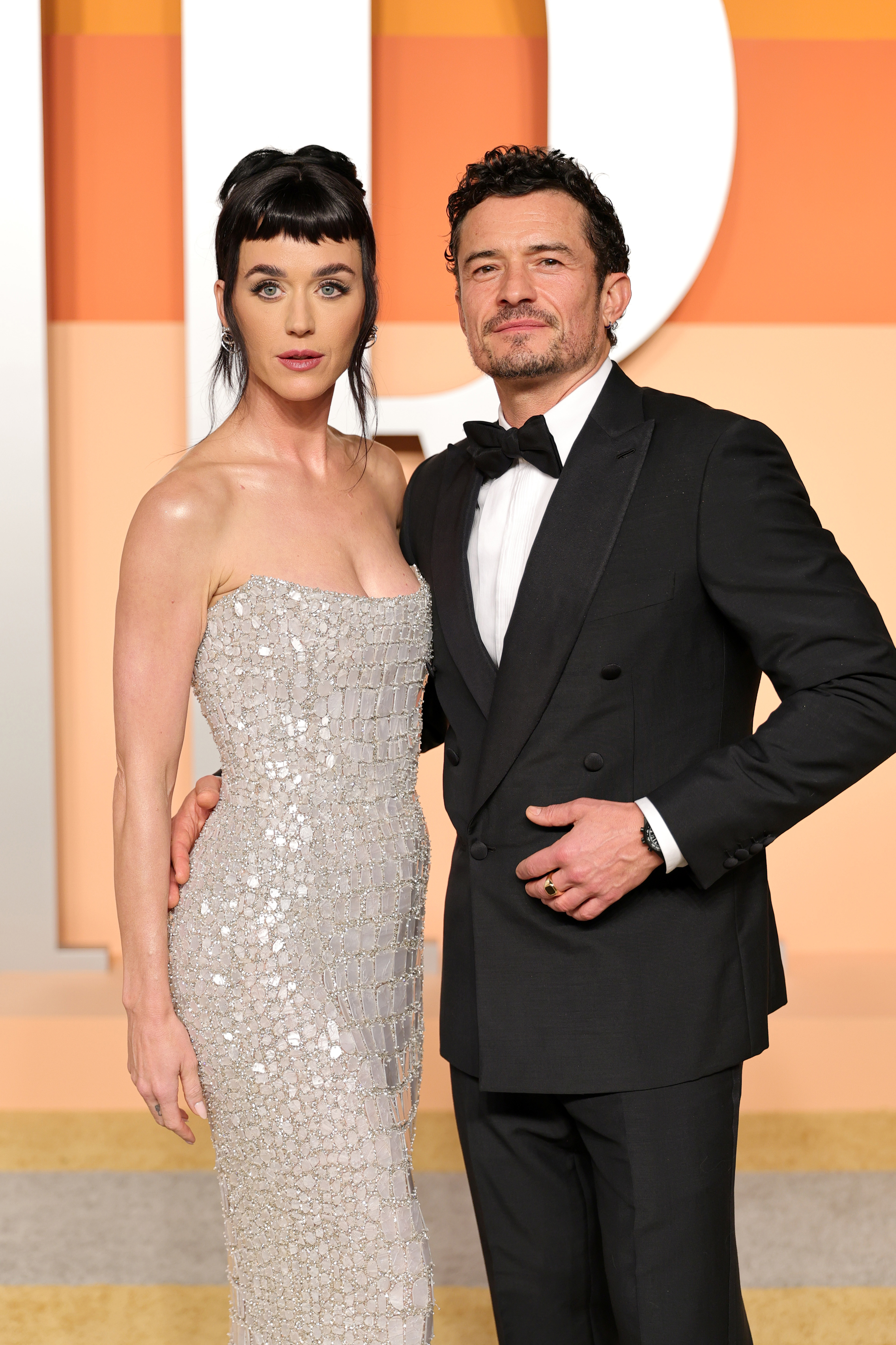 Katy Perry and Orlando Bloom at the 2025 Vanity Fair Oscar Party at Wallis Annenberg Center for the Performing Arts on March 2, 2025 in Beverly Hills, California. 