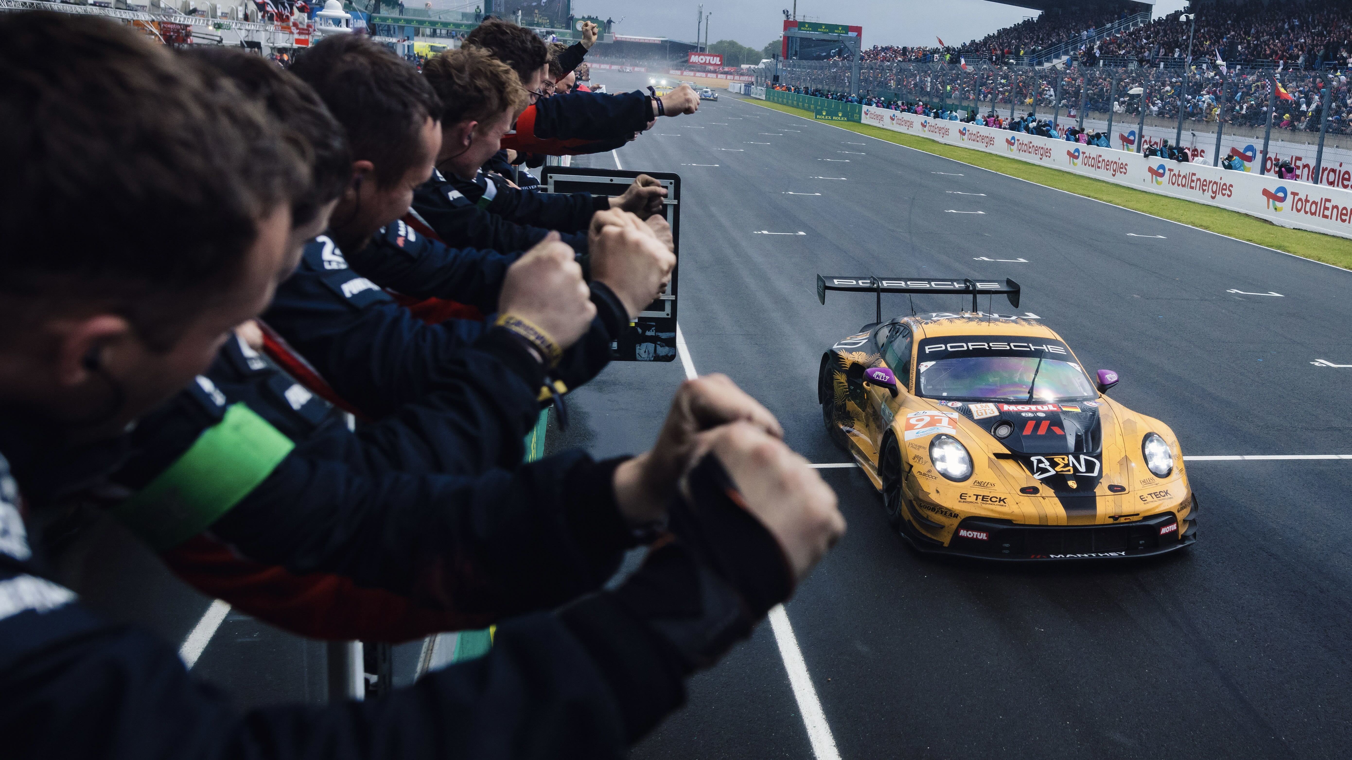 The No.91 Manthey EMA team celebrates winning the LMGT3 class at the 24 Hours of Le Mans.