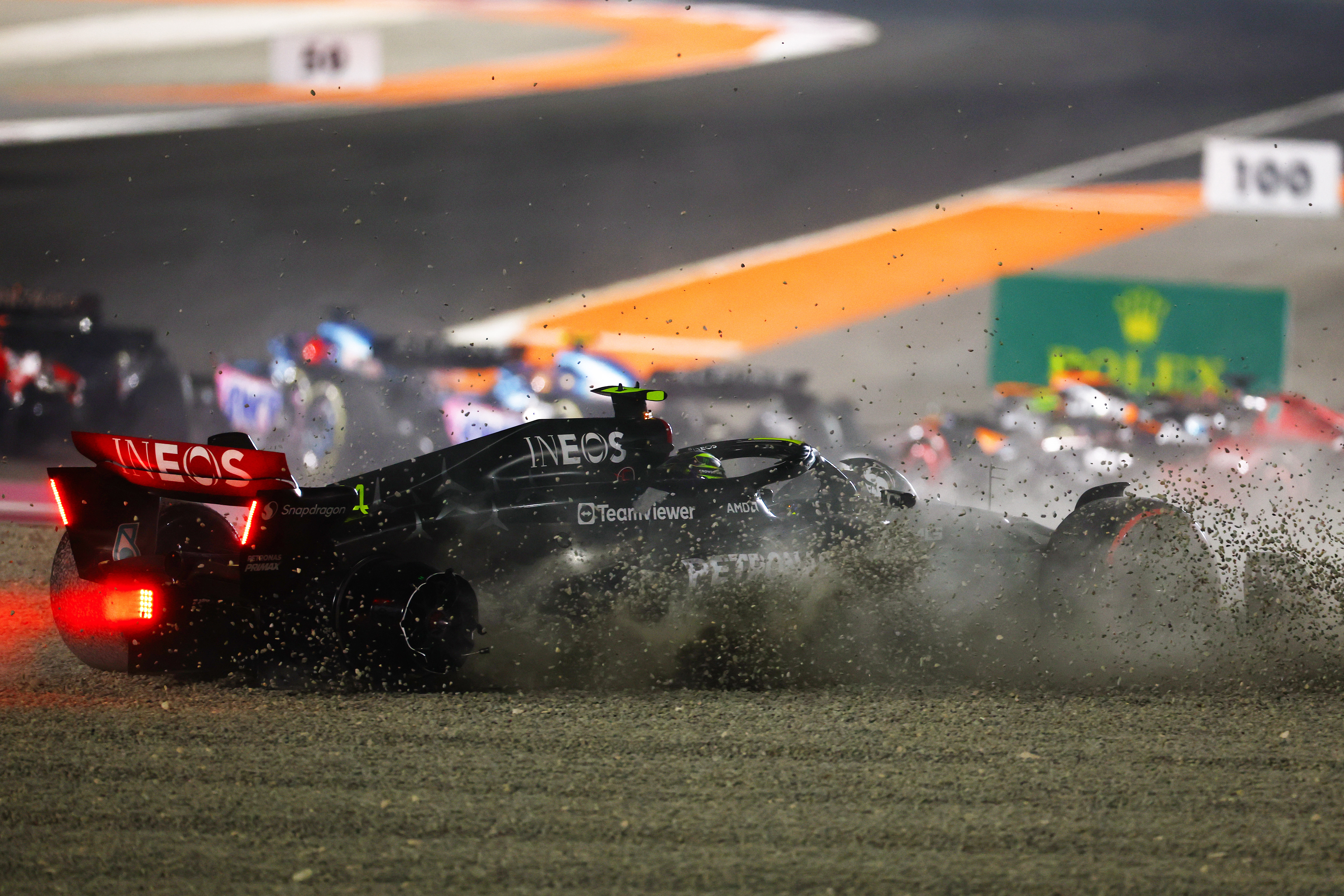 Lewis Hamilton of Great Britain runs into the gravel after crashing at turn one at the start of the Grand Prix of Qatar.