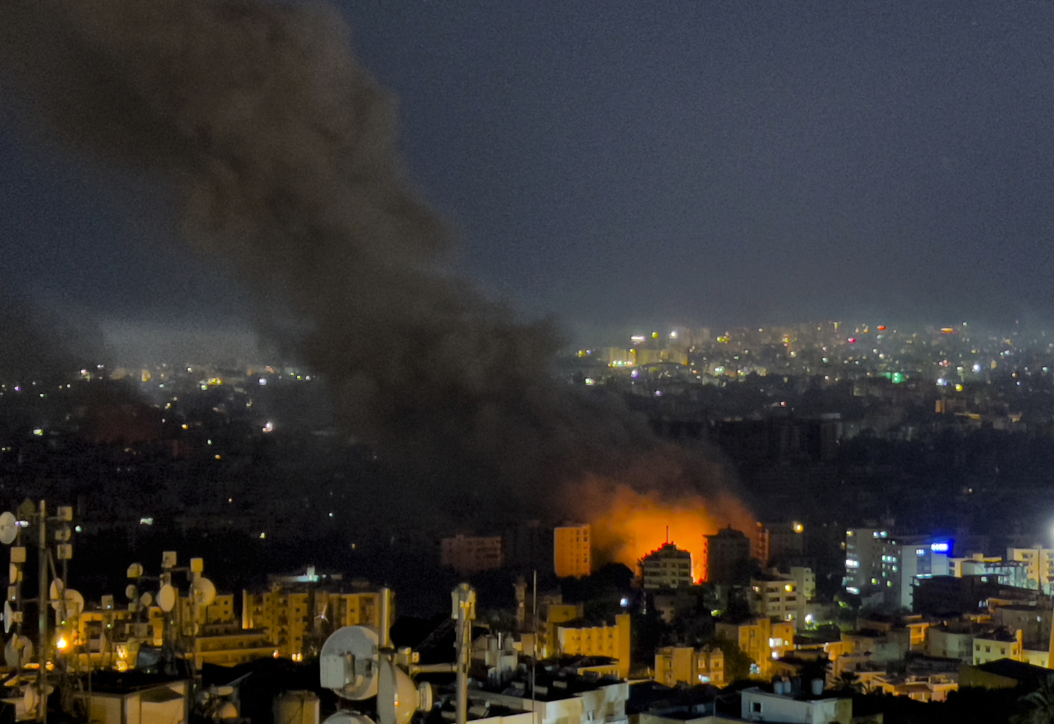 Flames and smoke rise from Israeli airstrikes in Dahiyeh, Beirut, Lebanon, Friday, Oct. 4, 2024 