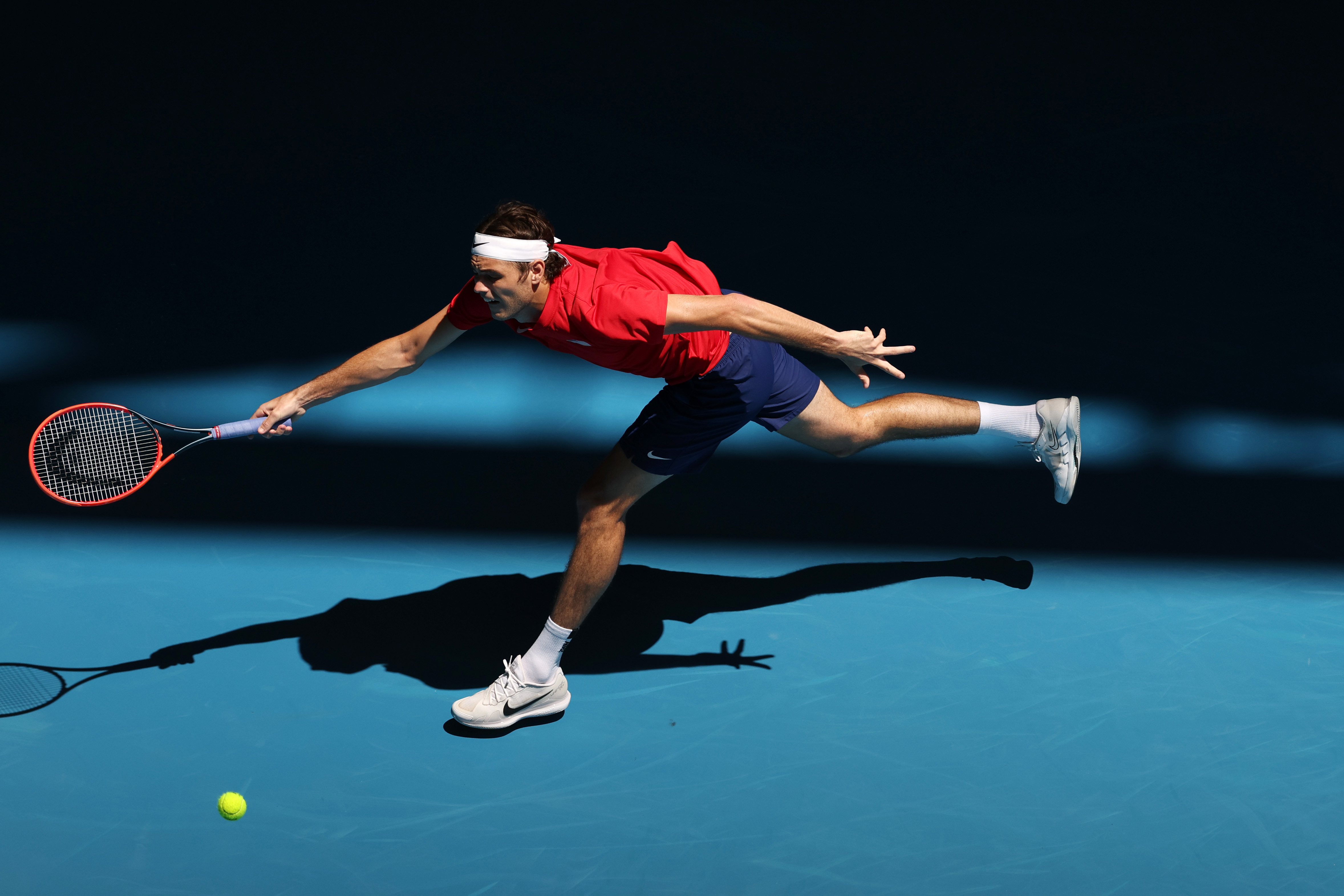 PERTH, AUSTRALIA - DECEMBER 31: Taylor Fritz of USA plays a forehand in the Men's singles match against Cameron Norrie of Great Britain during day three of the 2024 United Cup at RAC Arena on December 31, 2023 in Perth, Australia. (Photo by Will Russell/Getty Images)