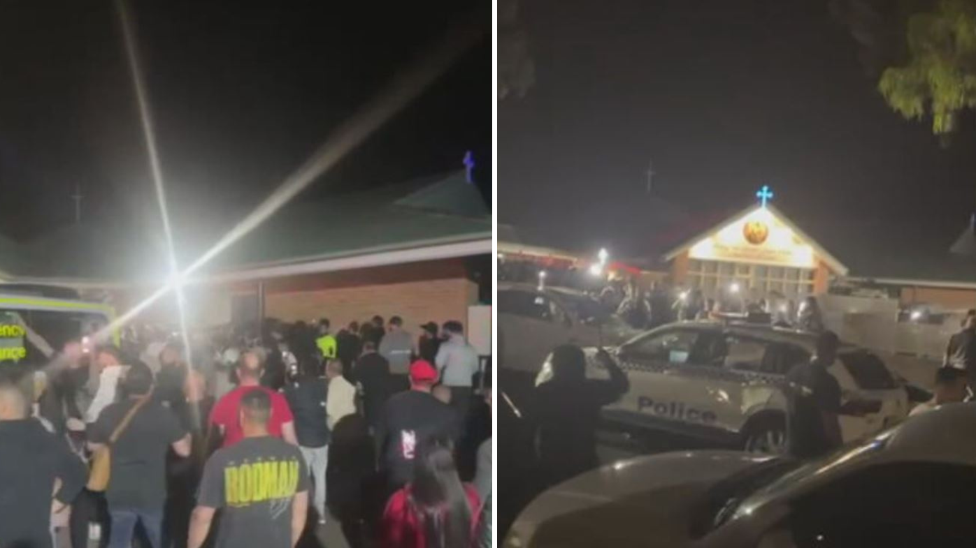 Large angry crowd outside Western Sydney church
