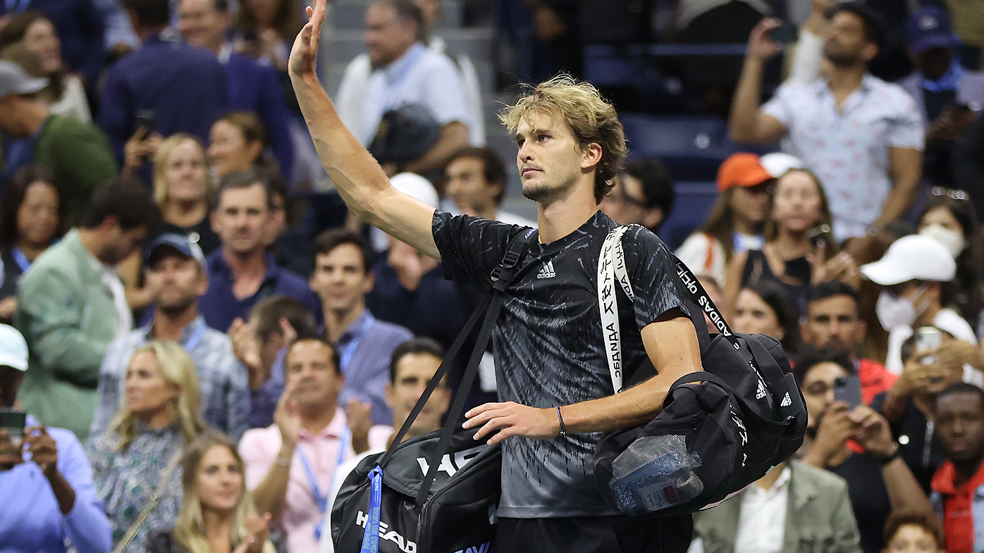 Alexander Zverev of Germany waves after being defeated by Novak Djokovic 