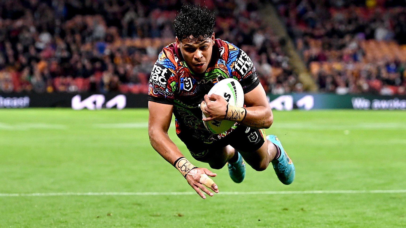 Brisbane, Australia. May 18, 2023. Selwyn Cobbo of the Broncos scores a try  during the NRL Round 12 match between the Brisbane Broncos and the Penrith  Panthers at Suncorp Stadium in Brisbane