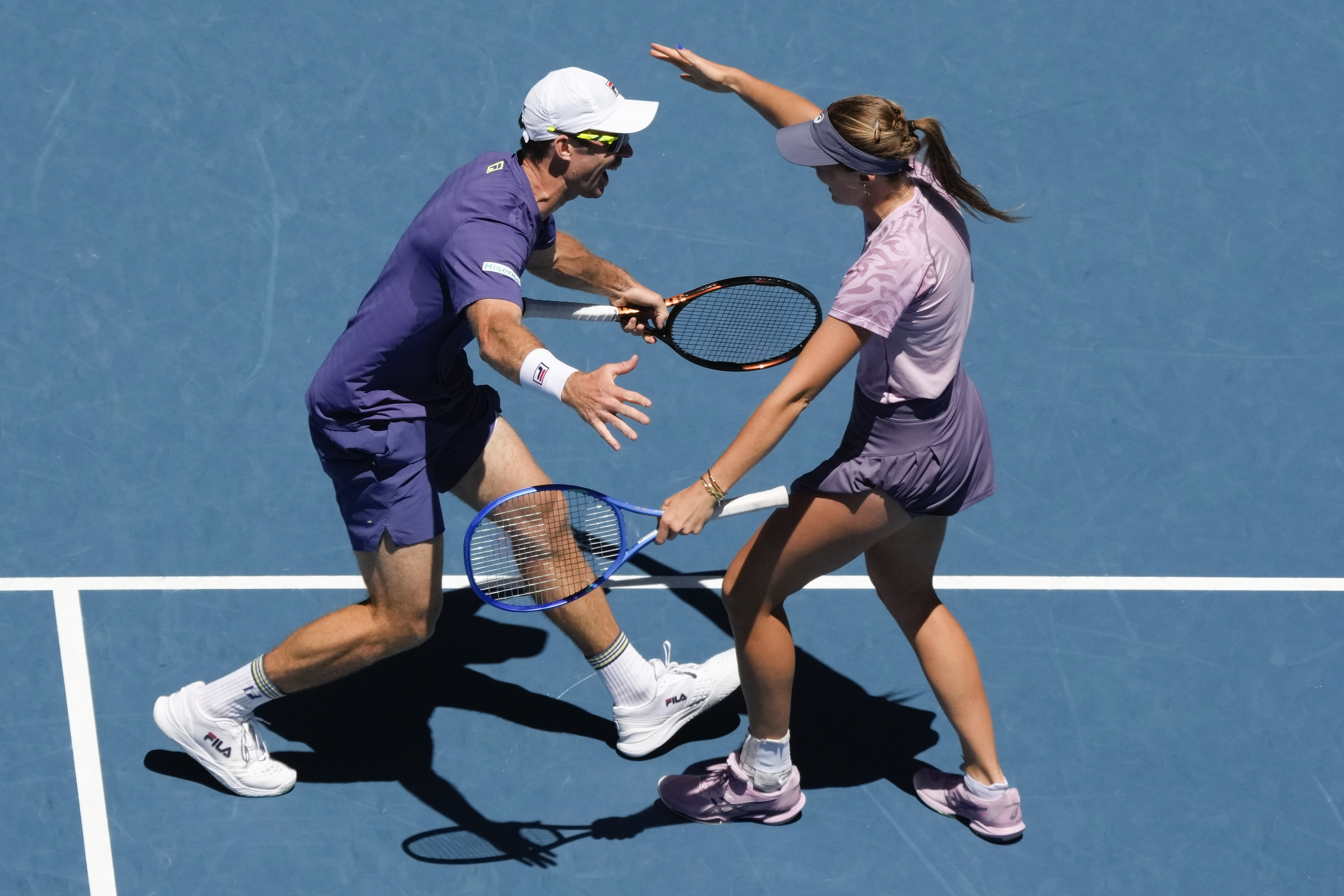 Olivia Gadecki and John Peers of Australia celebrate after defeating compatriots Kimberly Birrell and John-Patrick Smith in the mixed doubles final.