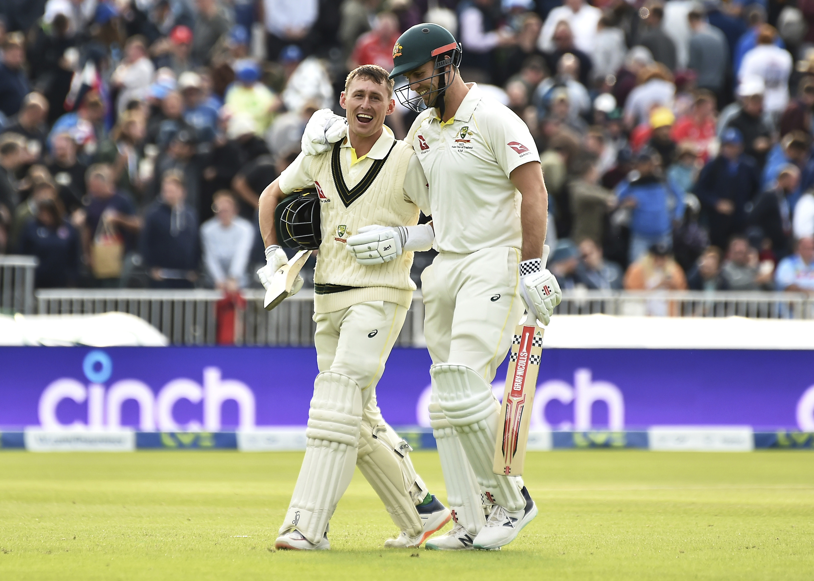Australia's Marnus Labuschagne and Mitchell Marsh leave the field at Old Trafford.