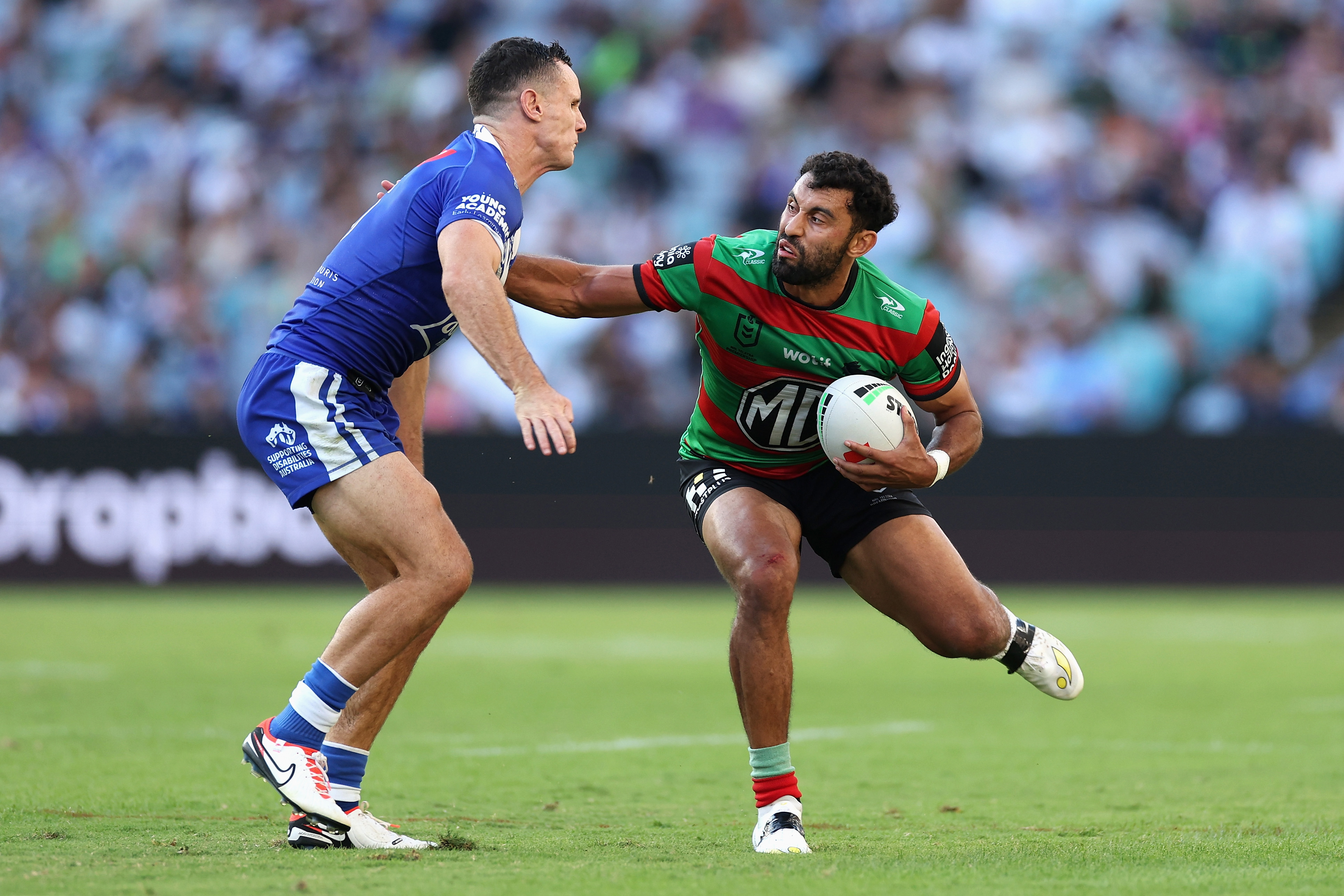 Alex Johnston is tackled during the round four NRL match between the South Sydney Rabbitohs and the Canterbury Bulldogs.