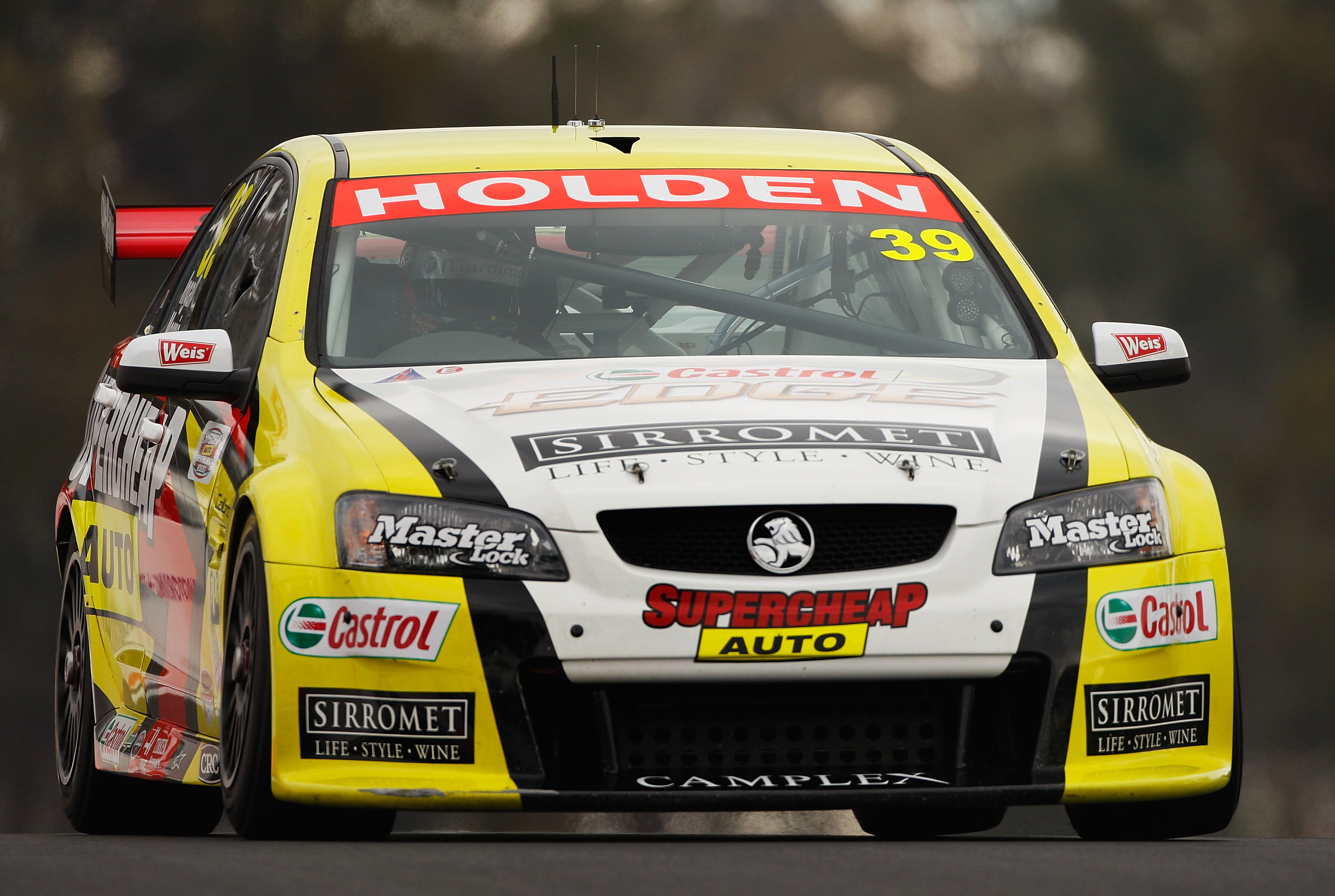 The Holden VE Commodore of Russell Ingall and Paul Morris of Supercheap Auto Racing in action during practice for the Bathurst 1000.