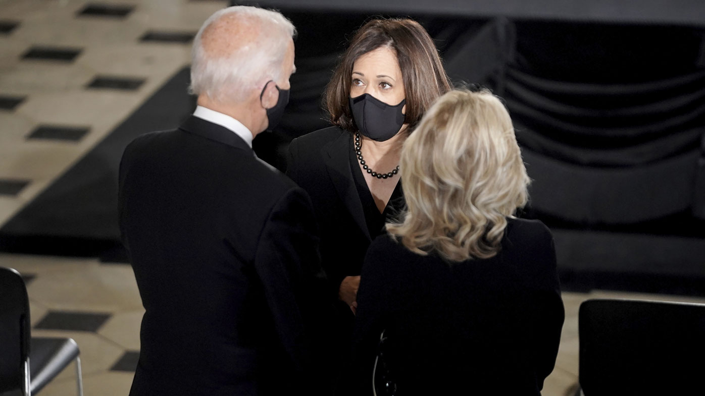 Democratic presidential candidate former Vice President Joe Biden and his wife Jill talk to Democratic vice presidential candidate Sen. Kamala Harris, D-Calif., before a memorial service in honor of Justice Ruth Bader Ginsburg as she will lie in state in Statuary Hall of the U.S. Capitol, Friday, Sept. 25, 2020 in Washington