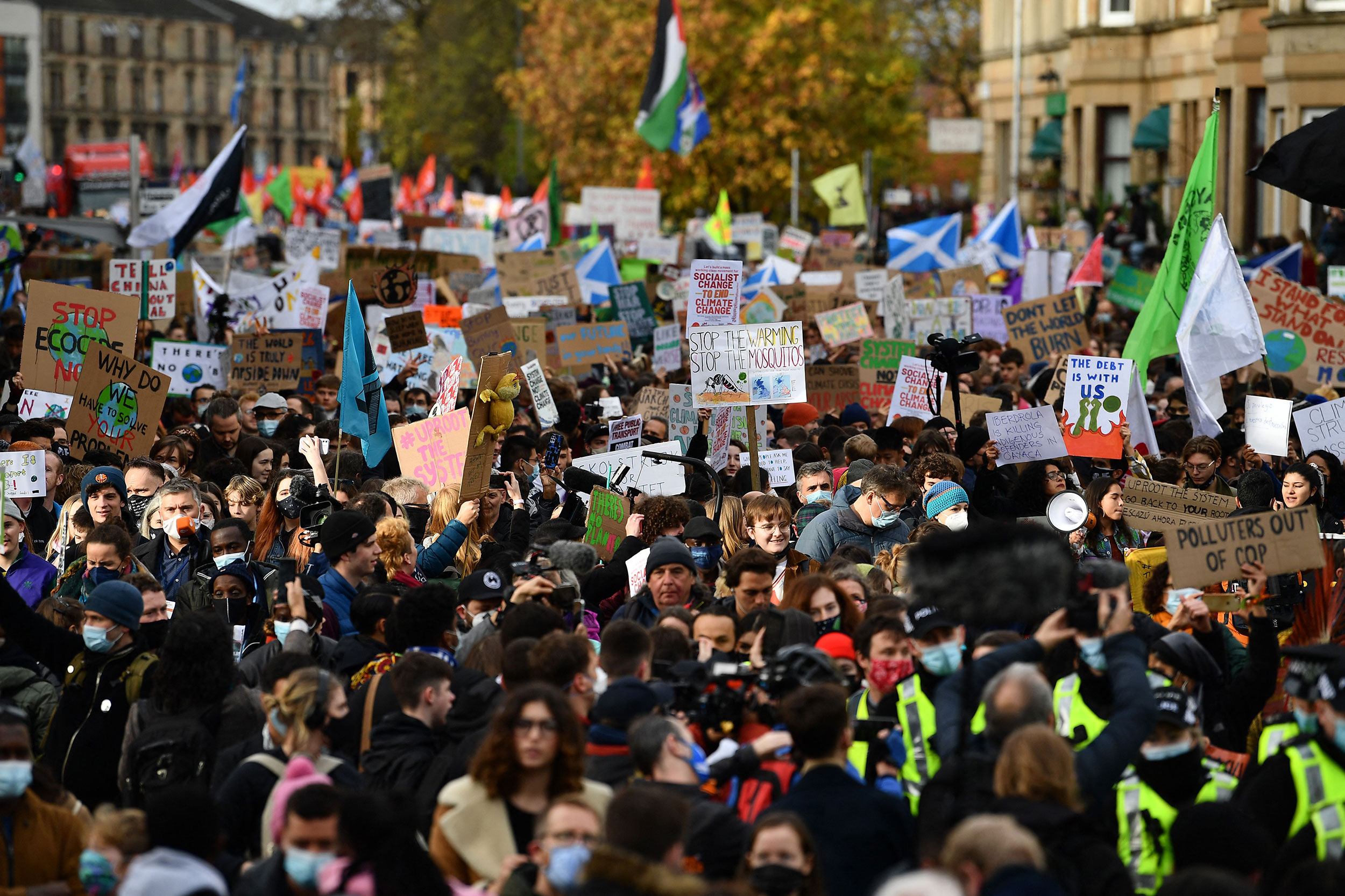 Youth activists march to protest against climate inaction on the sidelines of the COP26 UN Climate Summit in Glasgow