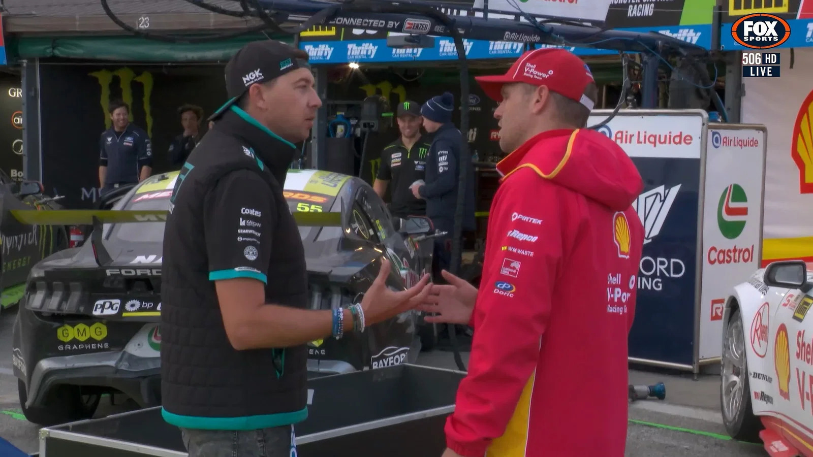 Kostecki and Mostert in pit lane. 