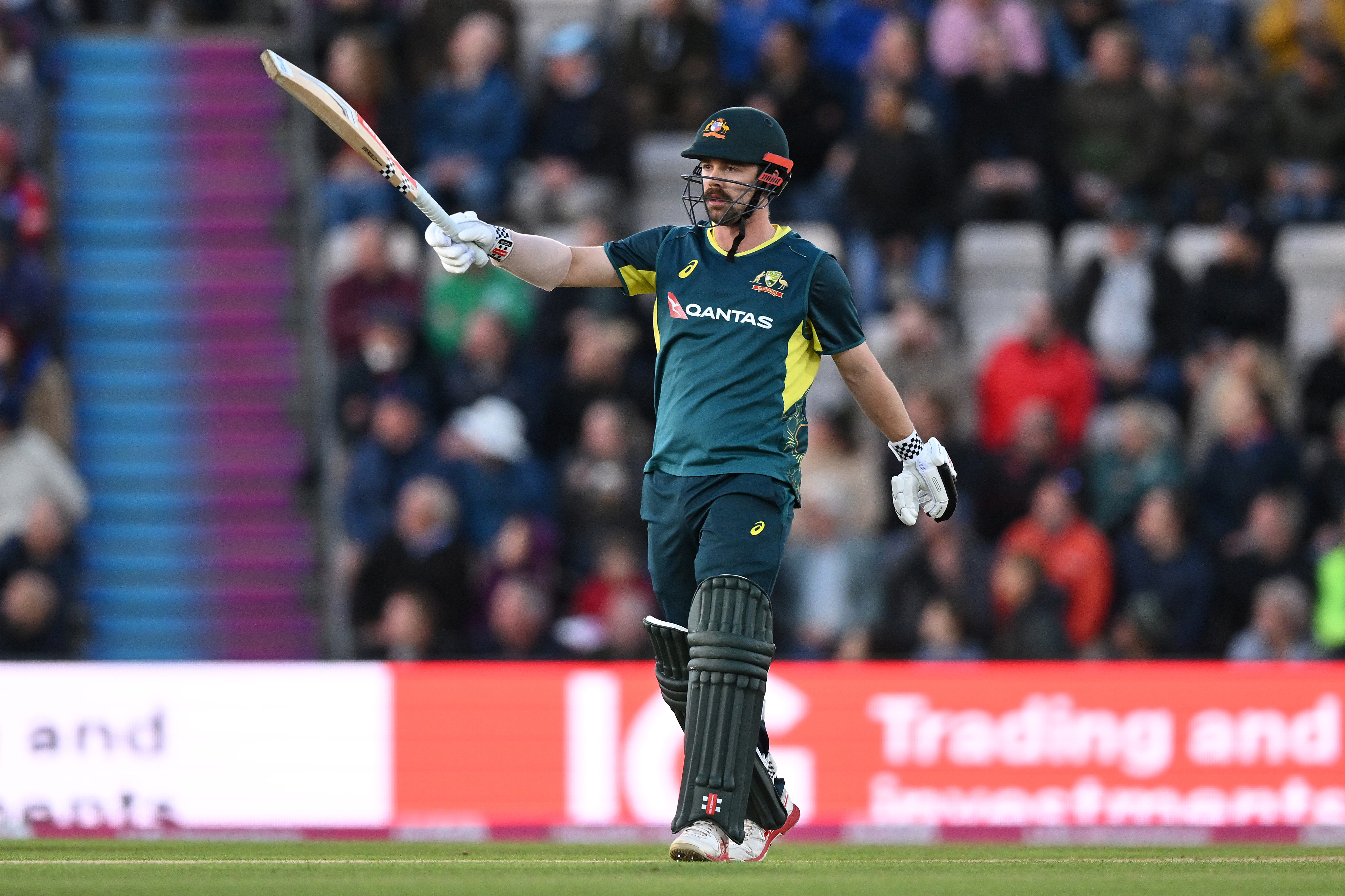 Travis Head of Australia celebrates reaching his 50.