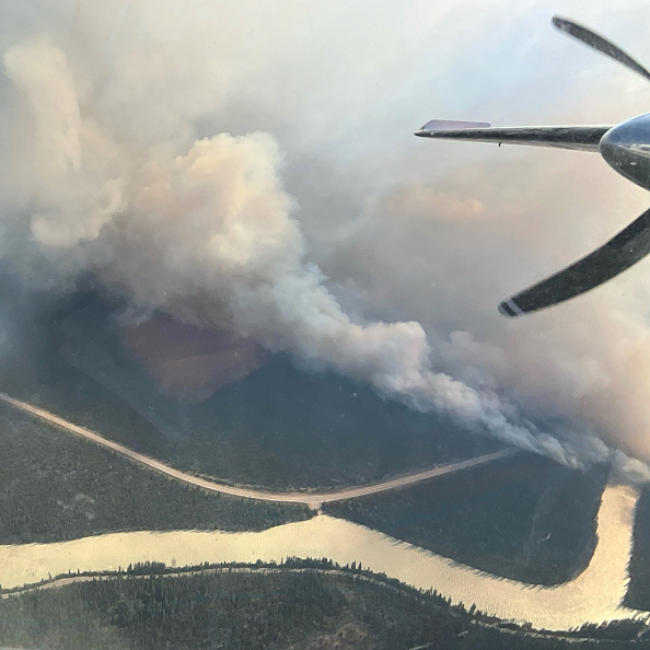 An aerial photo shows wildfire smoke rising over Jasper National Park.