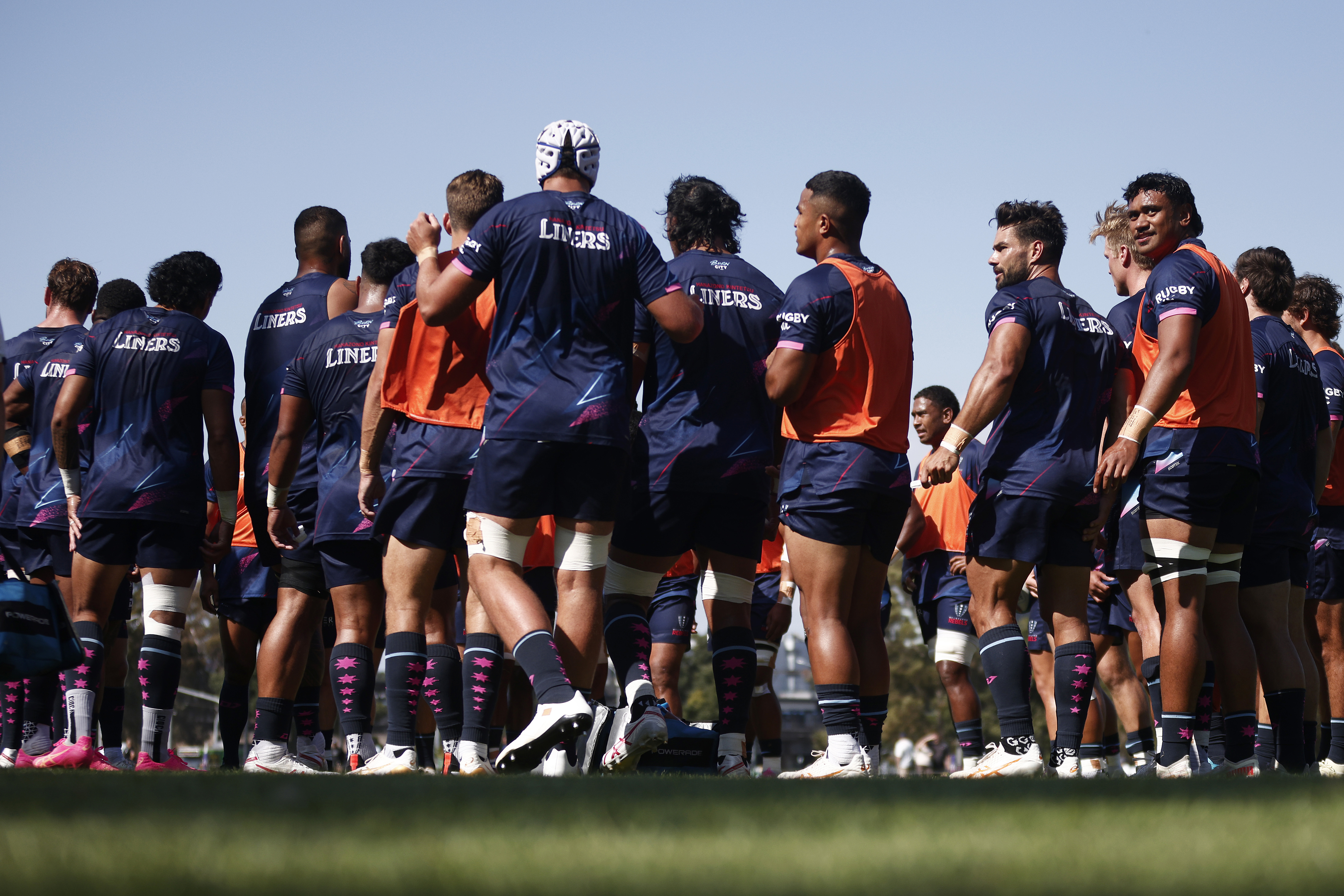 The Rebels huddle during a Super Rugby Pacific warm-up match.
