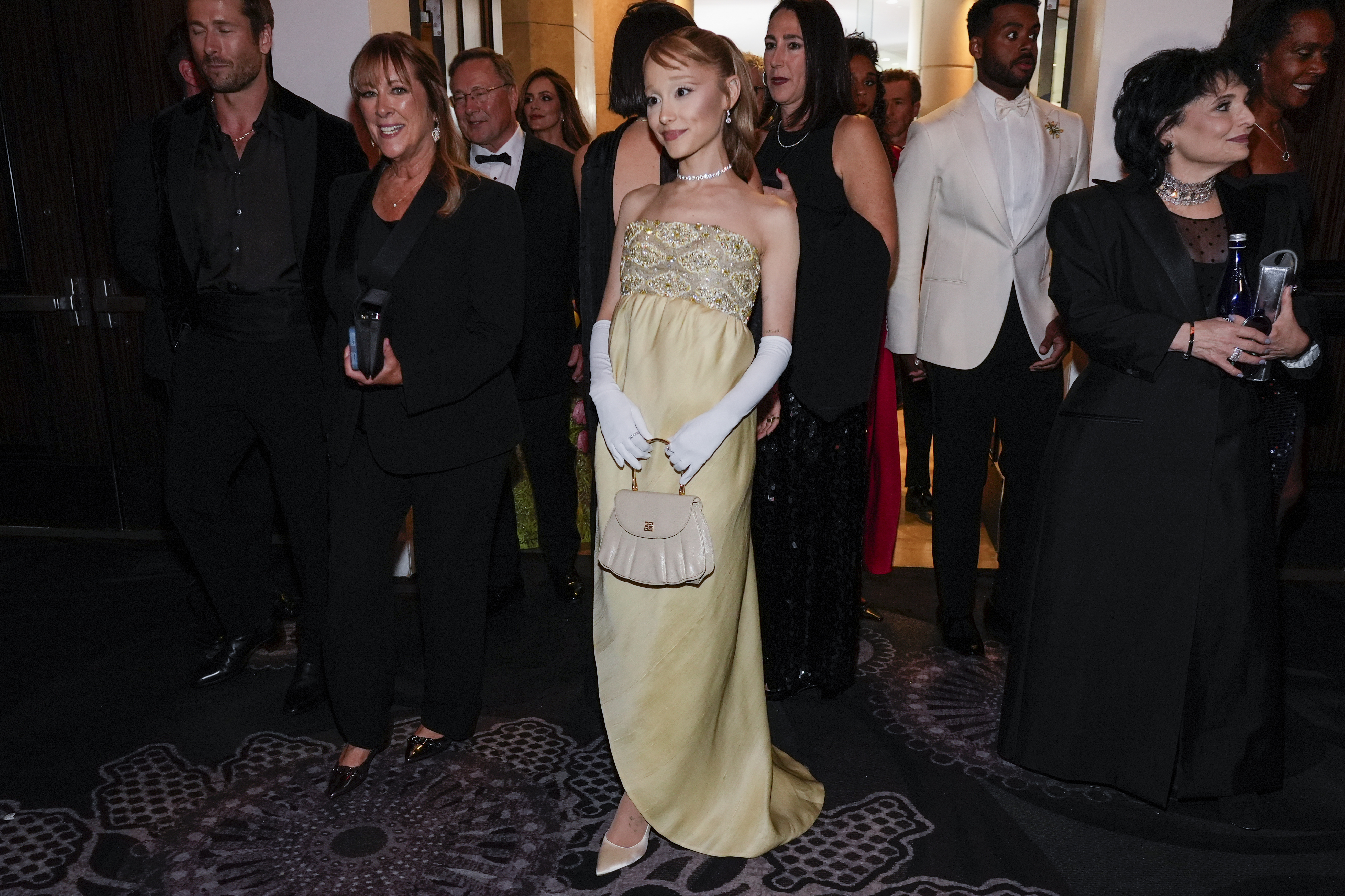 Ariana Grande arrives at the 82nd Golden Globes on Sunday, Jan. 5, 2025, at the Beverly Hilton in Beverly Hills, Calif. 