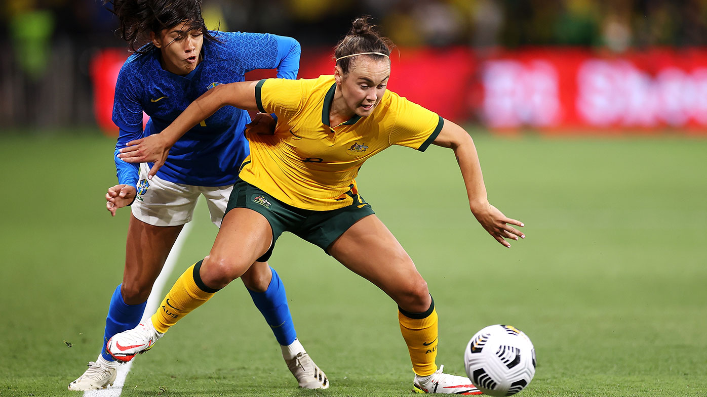  Antônia of Brazil and Caitlin Foord of the Matildas compete for the ball