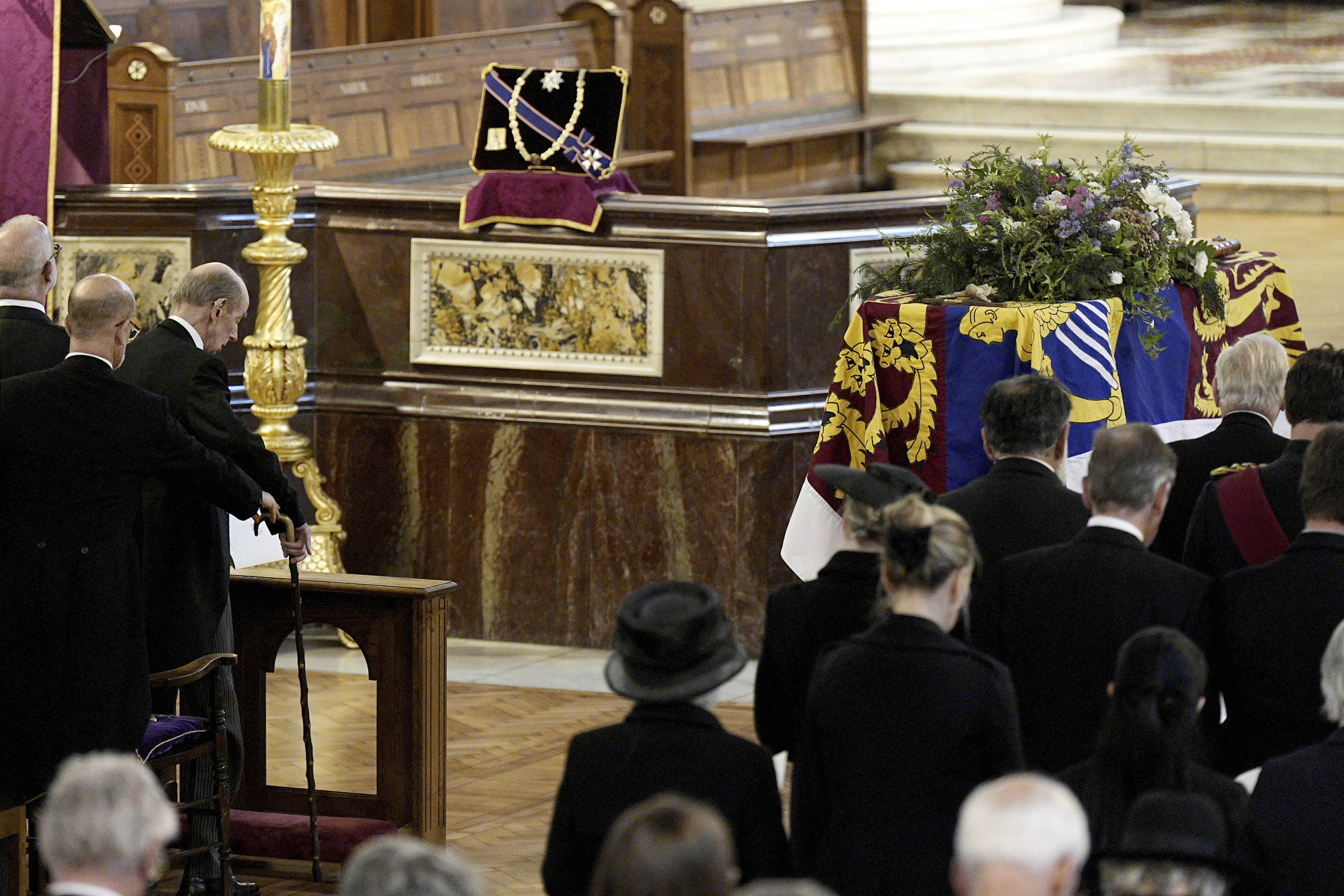 The Duke of Kent, third left, arrives as the coffin of the Duchess of Kent lies during the Requiem Mass service 