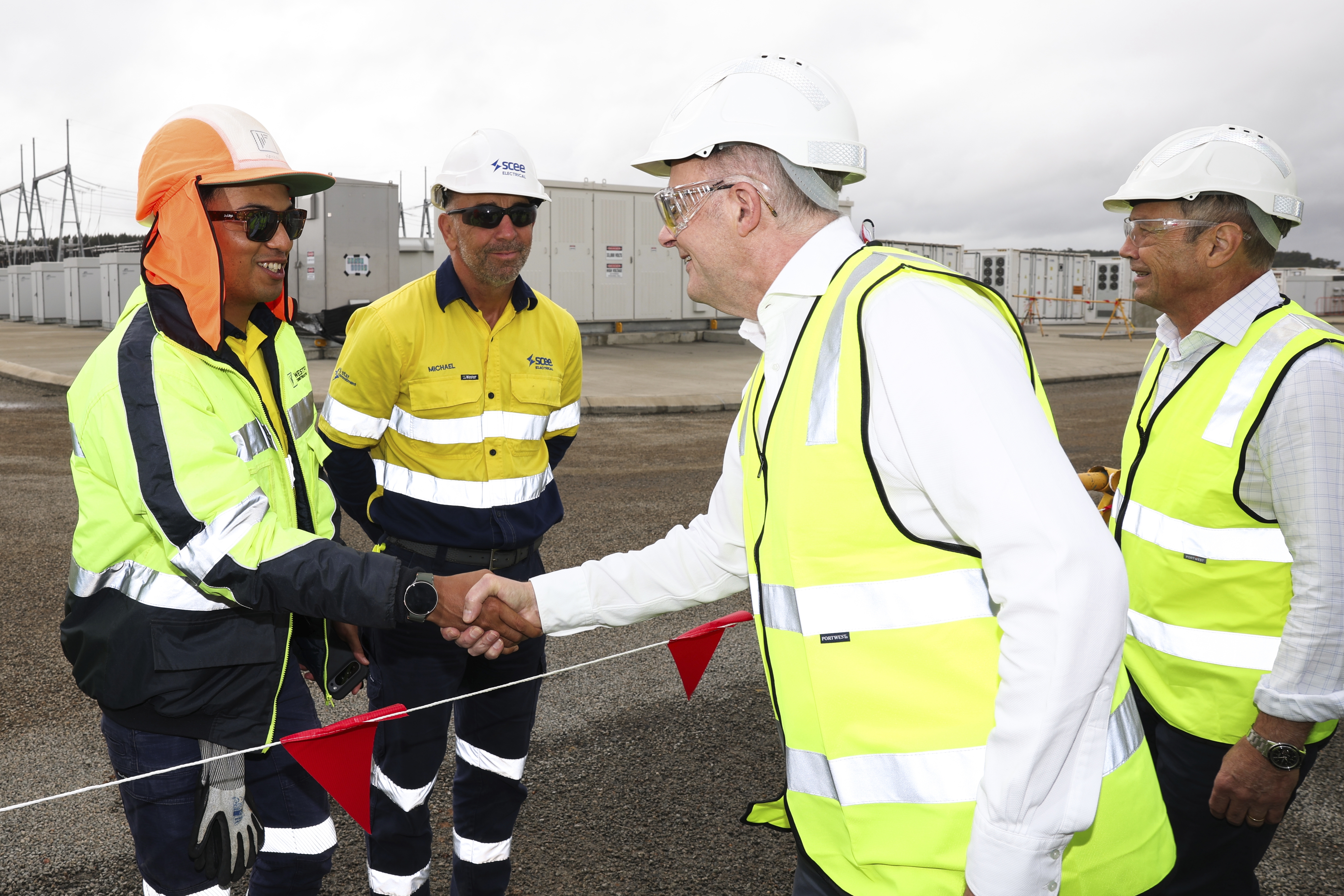 Prime Minister Anthony Albanese and WA Premier Roger Cook meet with workers during a visit to view the Collie Battery Energy Storage System at the Collie Power Station, in the electorate of O'Connor, in Collie, WA, on Wednesday 23 April 2025, during the 2025 federal election campaign.