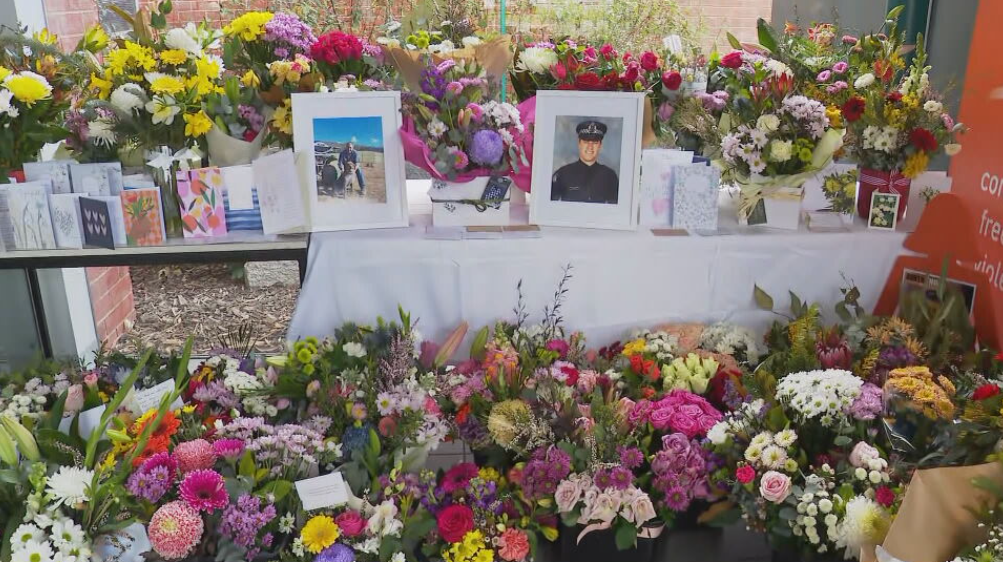 A floral tribute at Wangaratta Police Station is growing.