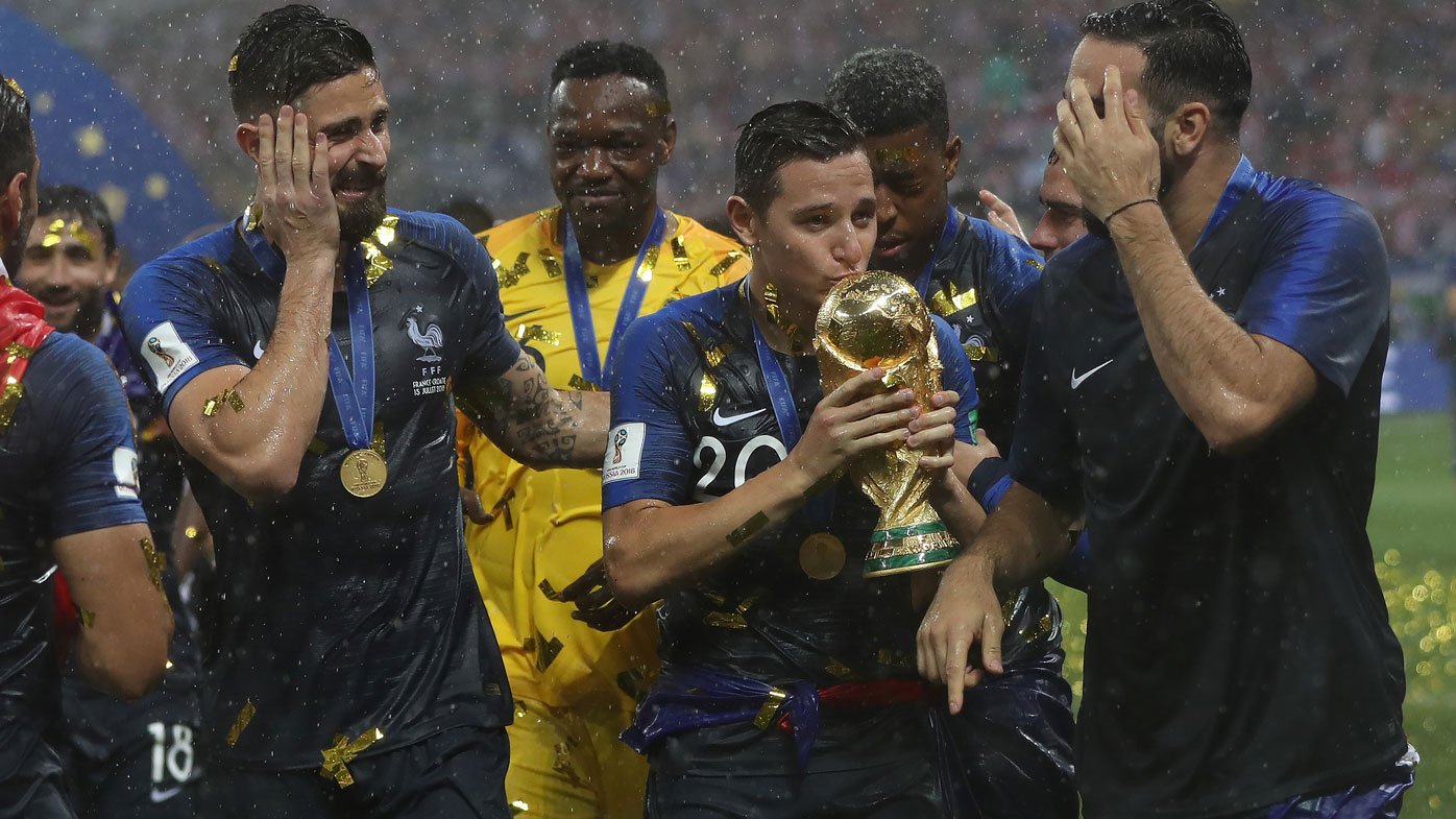 French teammates celebrate after winning the 2018 World Cup after beating Croatia.