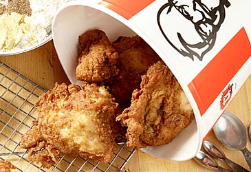 KFC chicken spilling out of bucket (Getty)