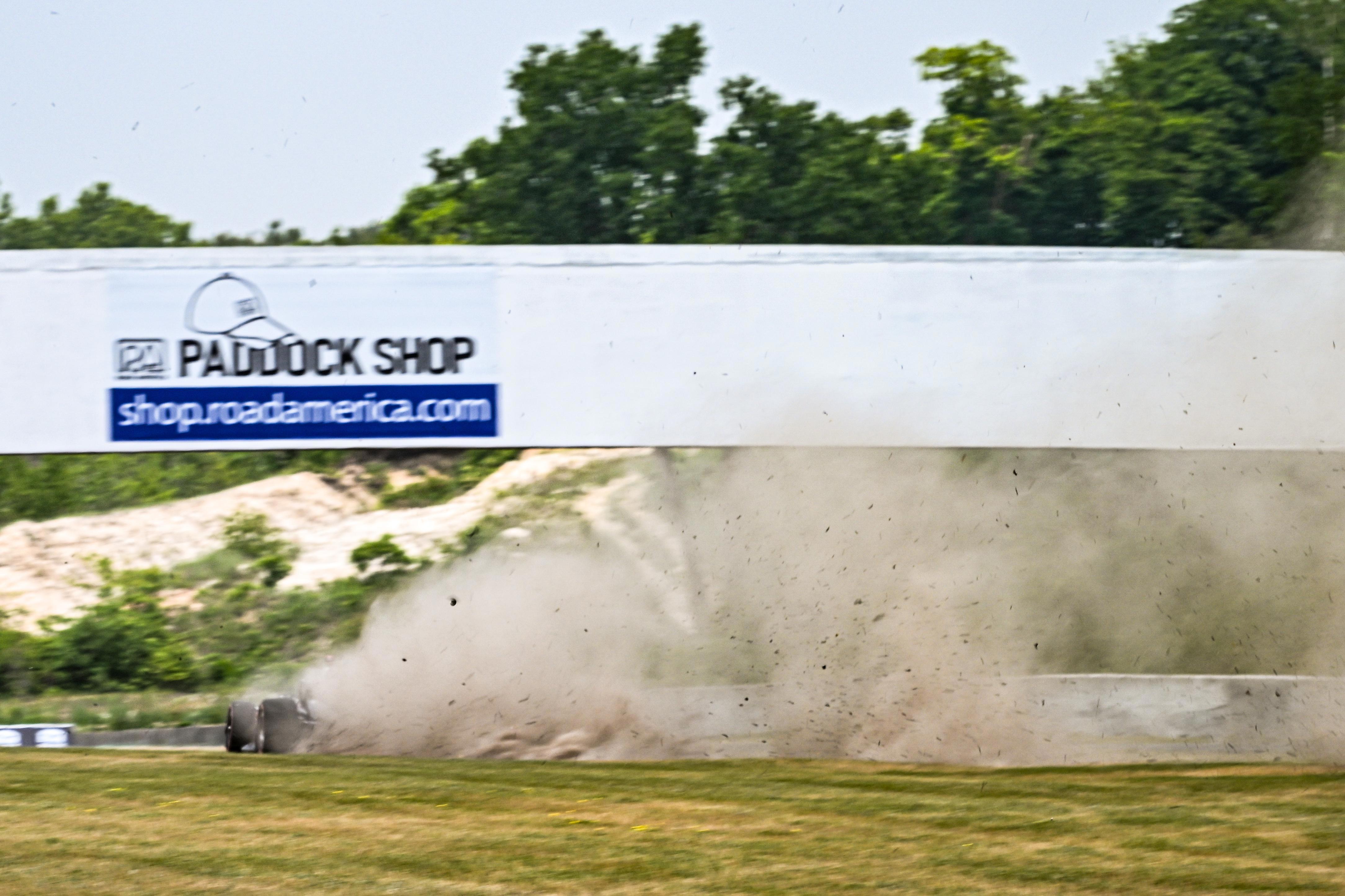 Will Power goes wide and kicks up dirt at Road America.
