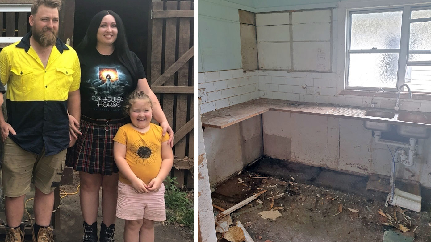Jenna Breeze, pictured with her husband Shannon and their daughter. Their home (right) is still gutted and empty 12 months on from the floods. 