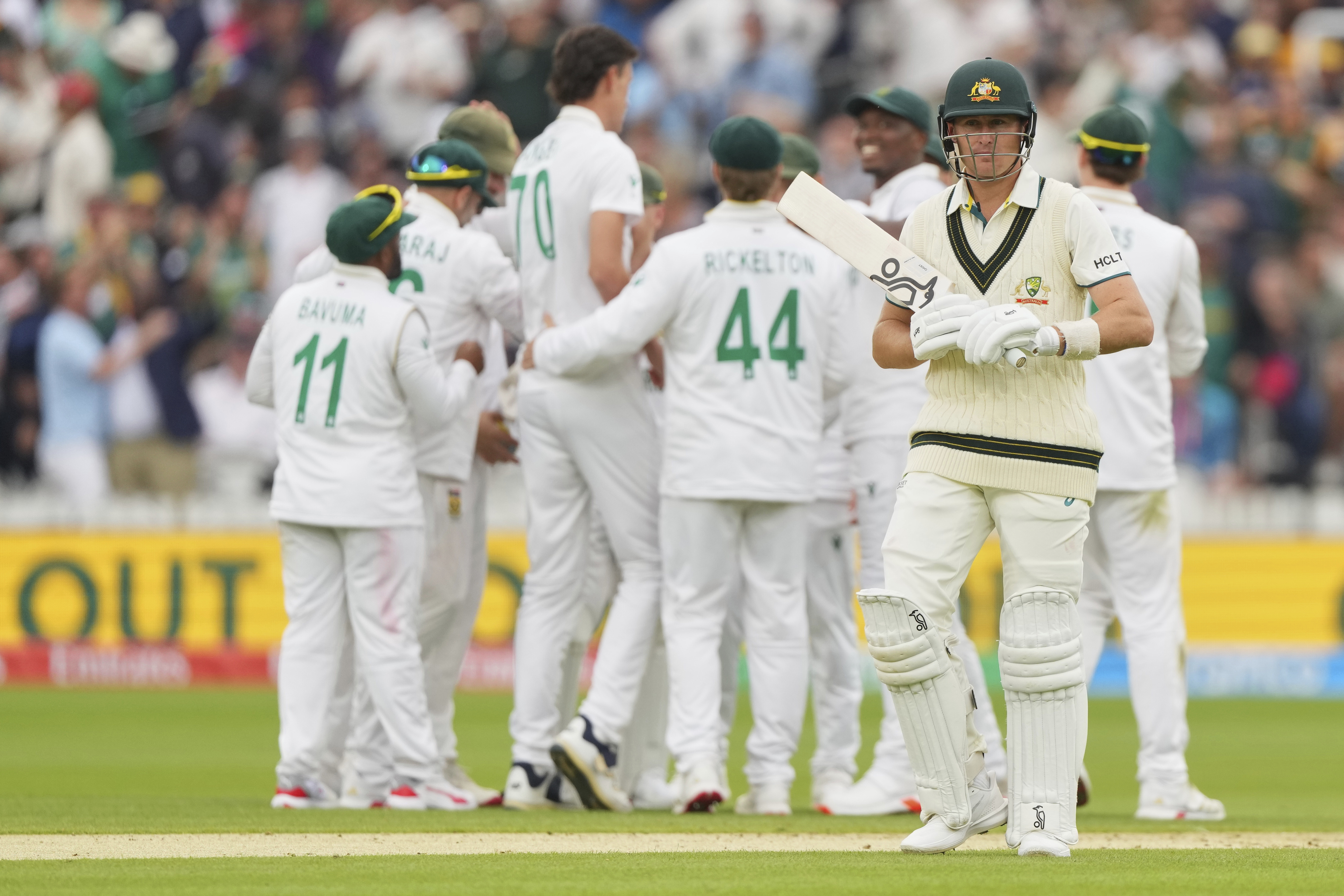 Australia's Marnus Labuschagne walks off the field after losing his wicket.