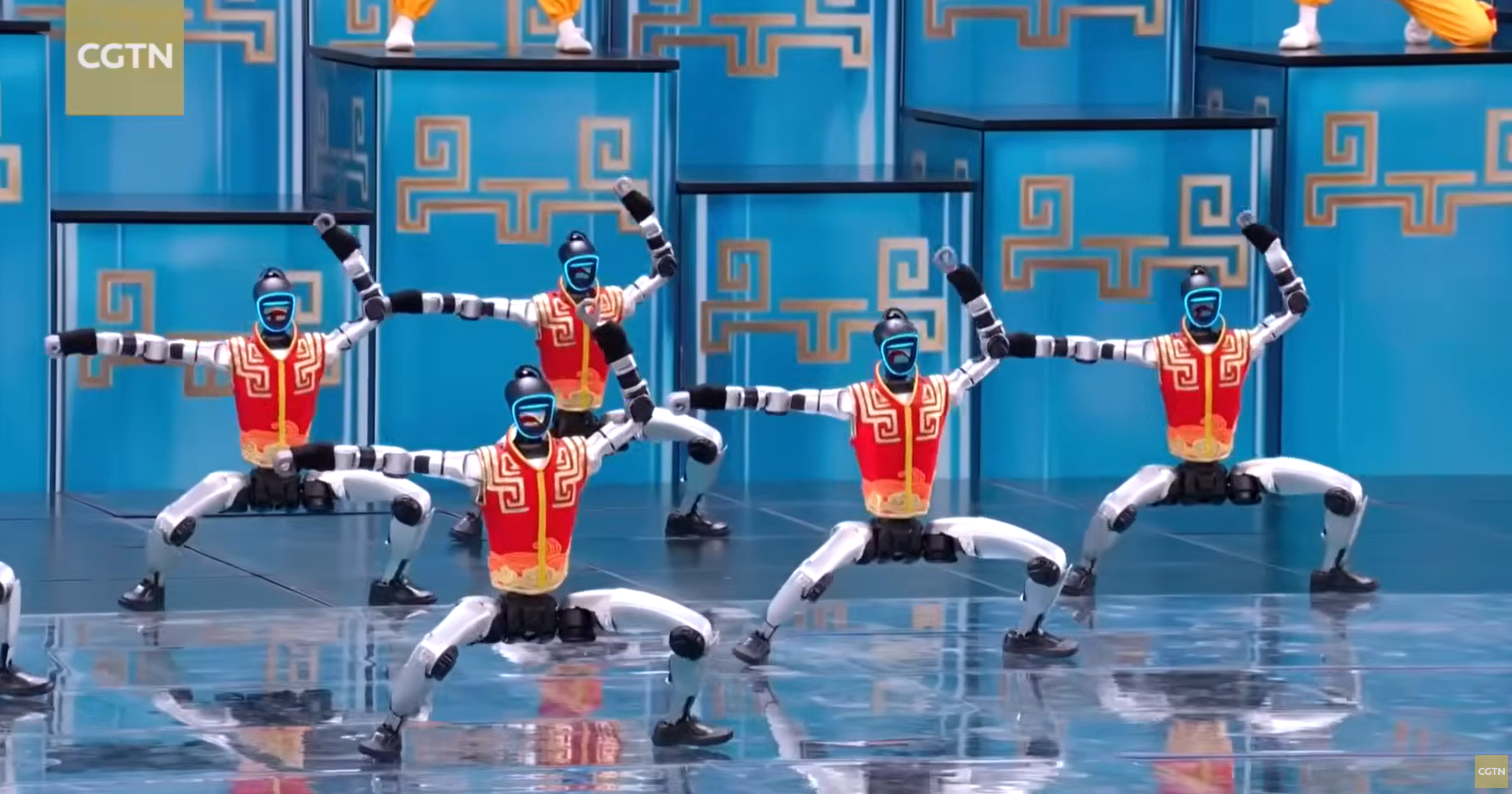 The robots at the Chinese New Year Gala performed alongside several child performers in a routine lasting almost five minutes.