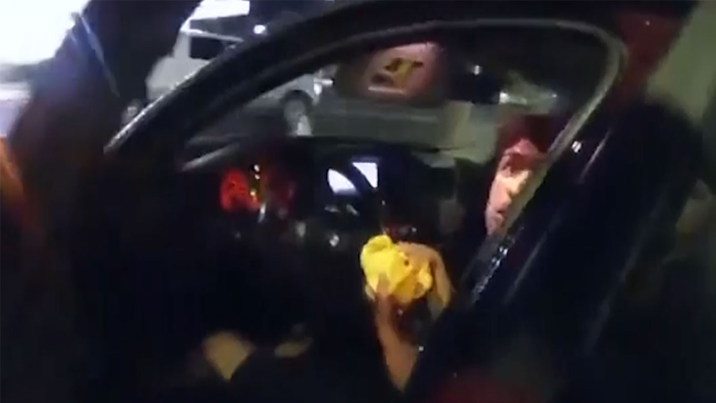 The officer opened the door without warning with his gun already pointed.