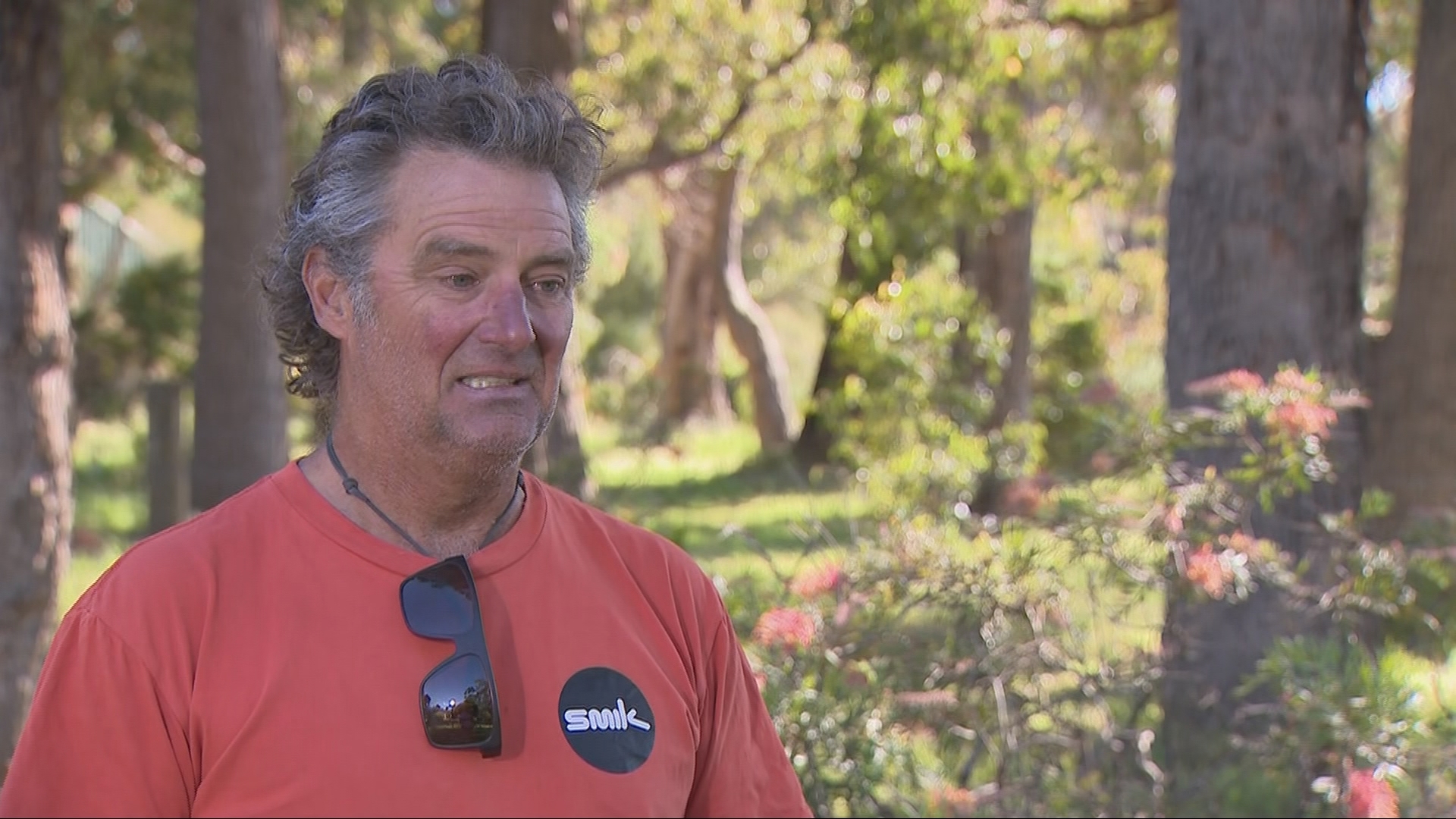 A man has shared how he managed to escape a suspected great white shark, which had knocked him into the water at a popular beach in Western Australia. ﻿