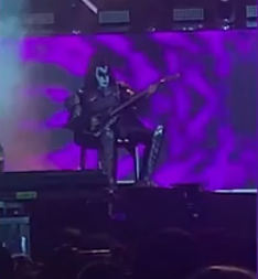 KISS star Gene Simmons ill on stage, performs seated on a chair