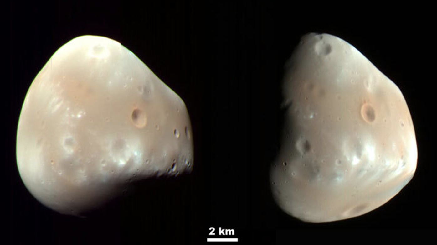 These color-enhanced views of Deimos, the smaller of the two moons of Mars, result from imaging on Feb. 21, 2009, by the High Resolution Imaging Science Experiment (HiRISE) camera on NASA's Mars Reconnaissance Orbiter. Image Credit: NASA/JPL-Caltech/University of Arizona