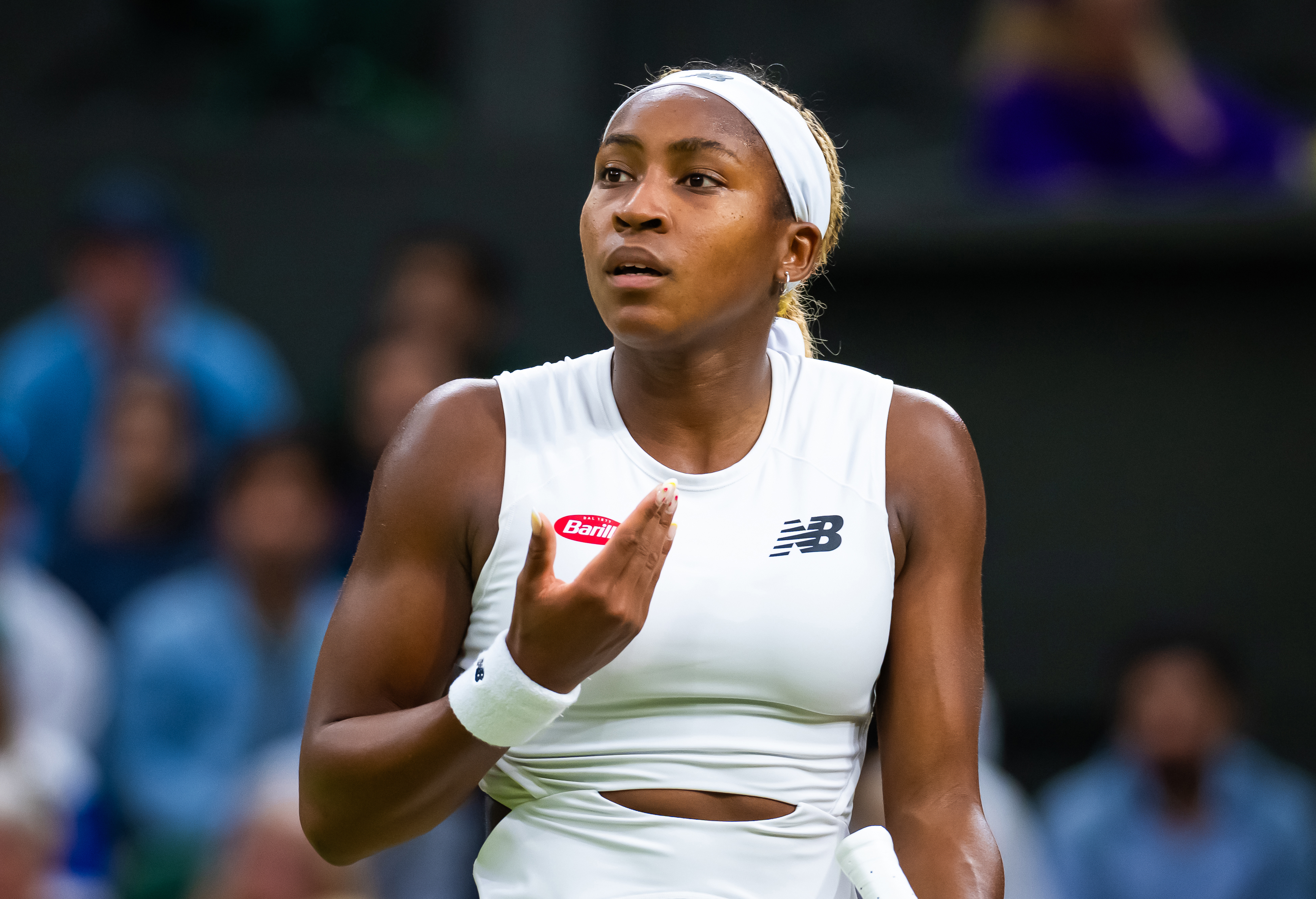 Coco Gauff reacts during her fourth-round loss to Emma Navarro.