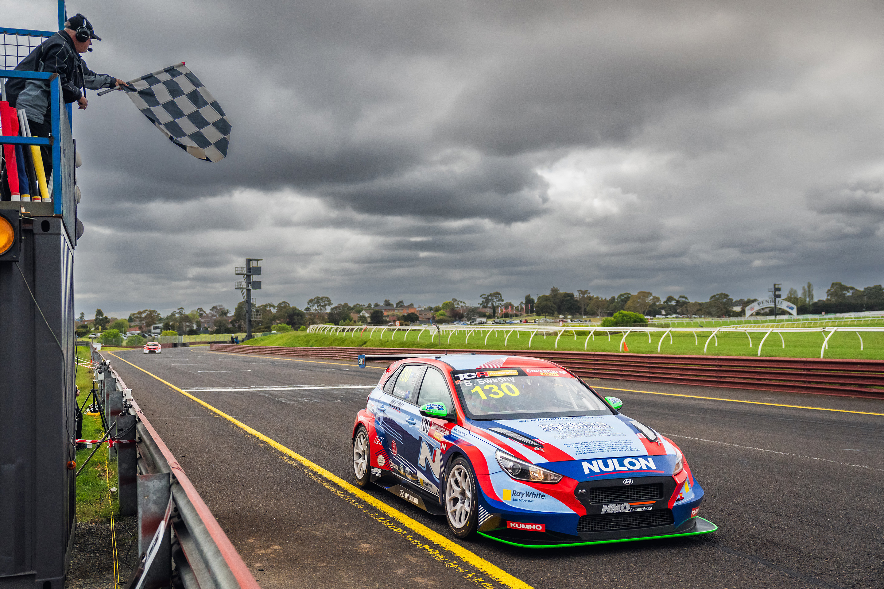 Bailey Sweeny takes the chequered flag in race three.