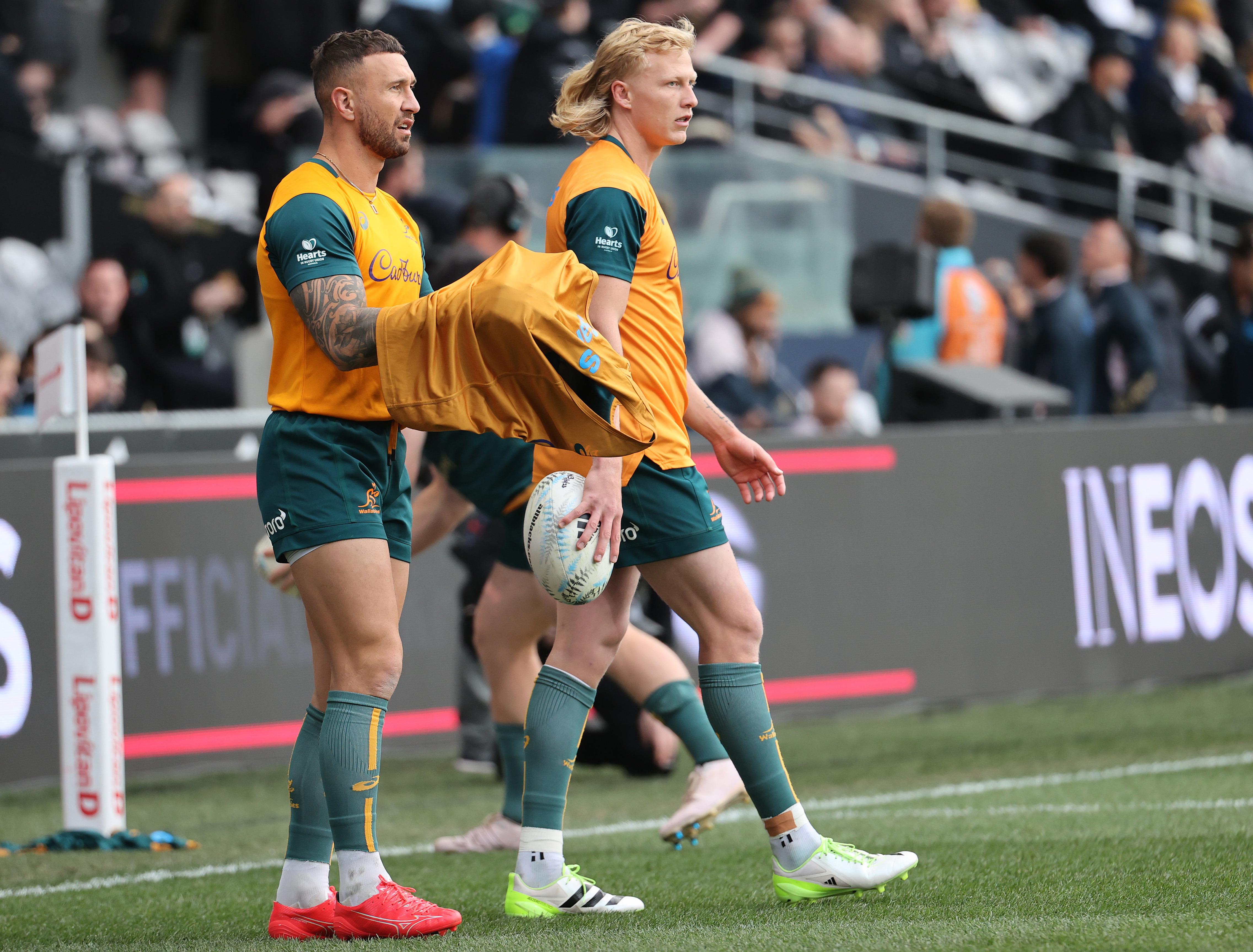 Quade Cooper (left) and Carter Gordon warm up before The Rugby Championship & Bledisloe Cup match between the All Blacks and Wallabies in Dunedin.