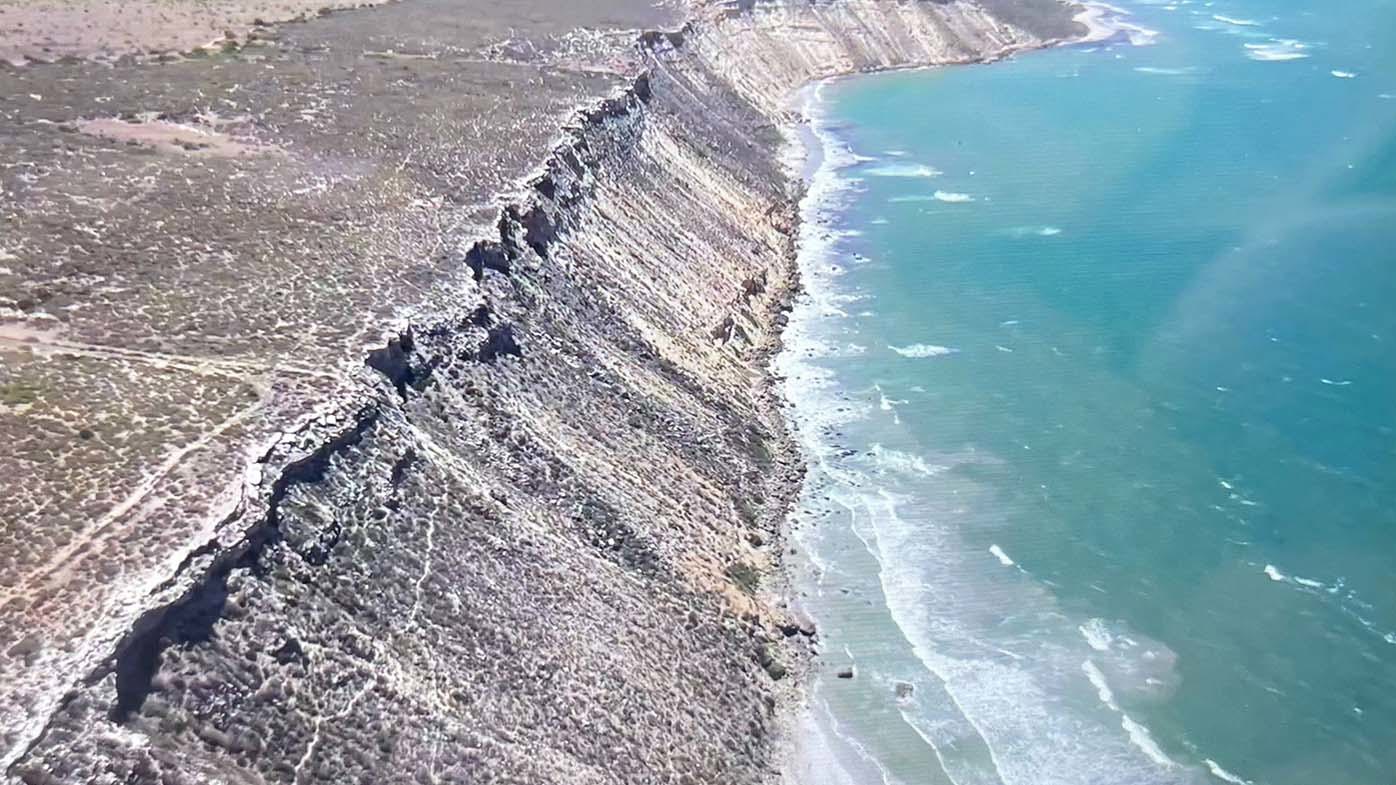 Two men have died and another has been injured after a car went off a cliff on the WA coast.