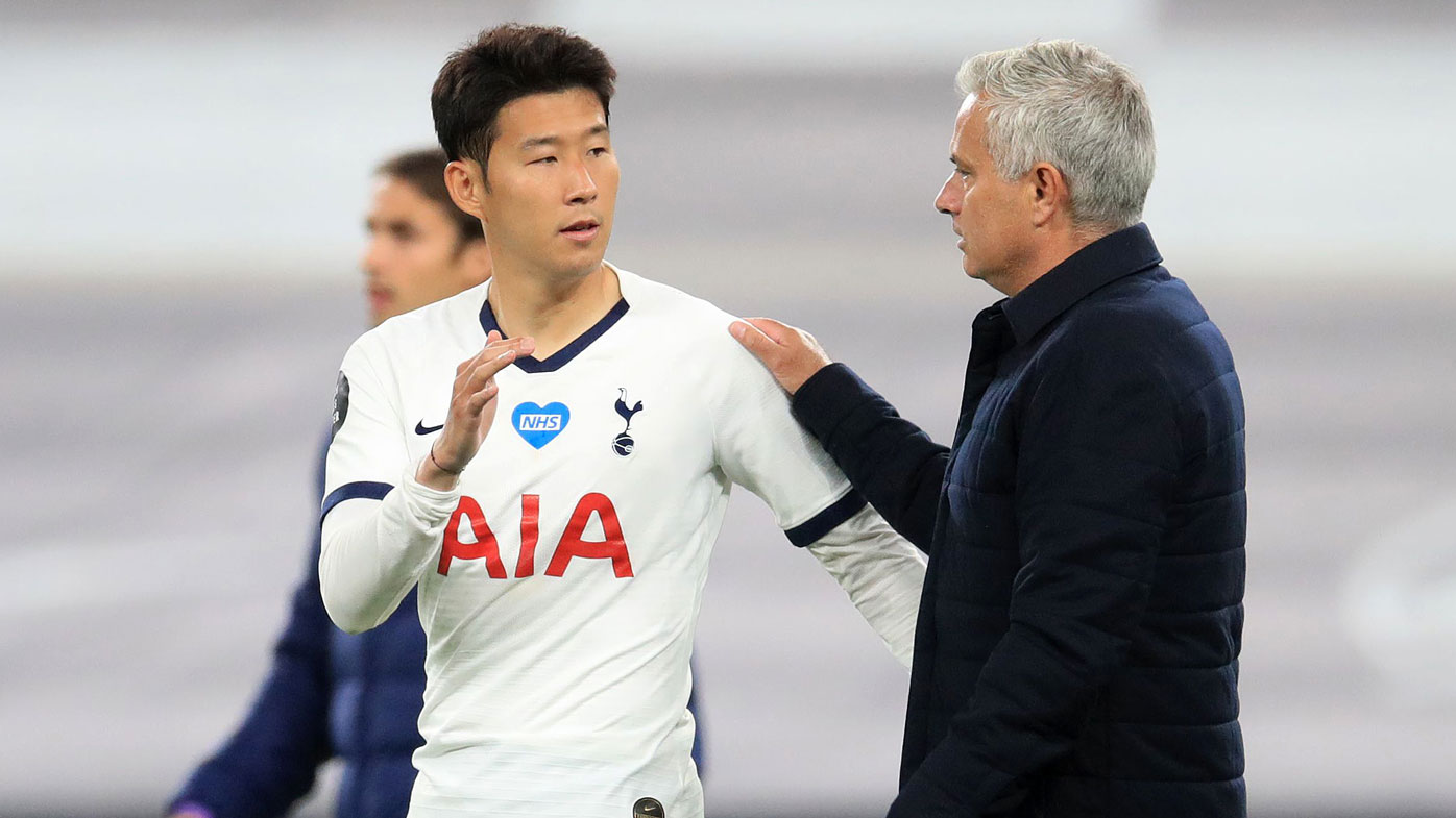 Heung-Min Son of Tottenham Hotspur interacts with Jose Mourinho