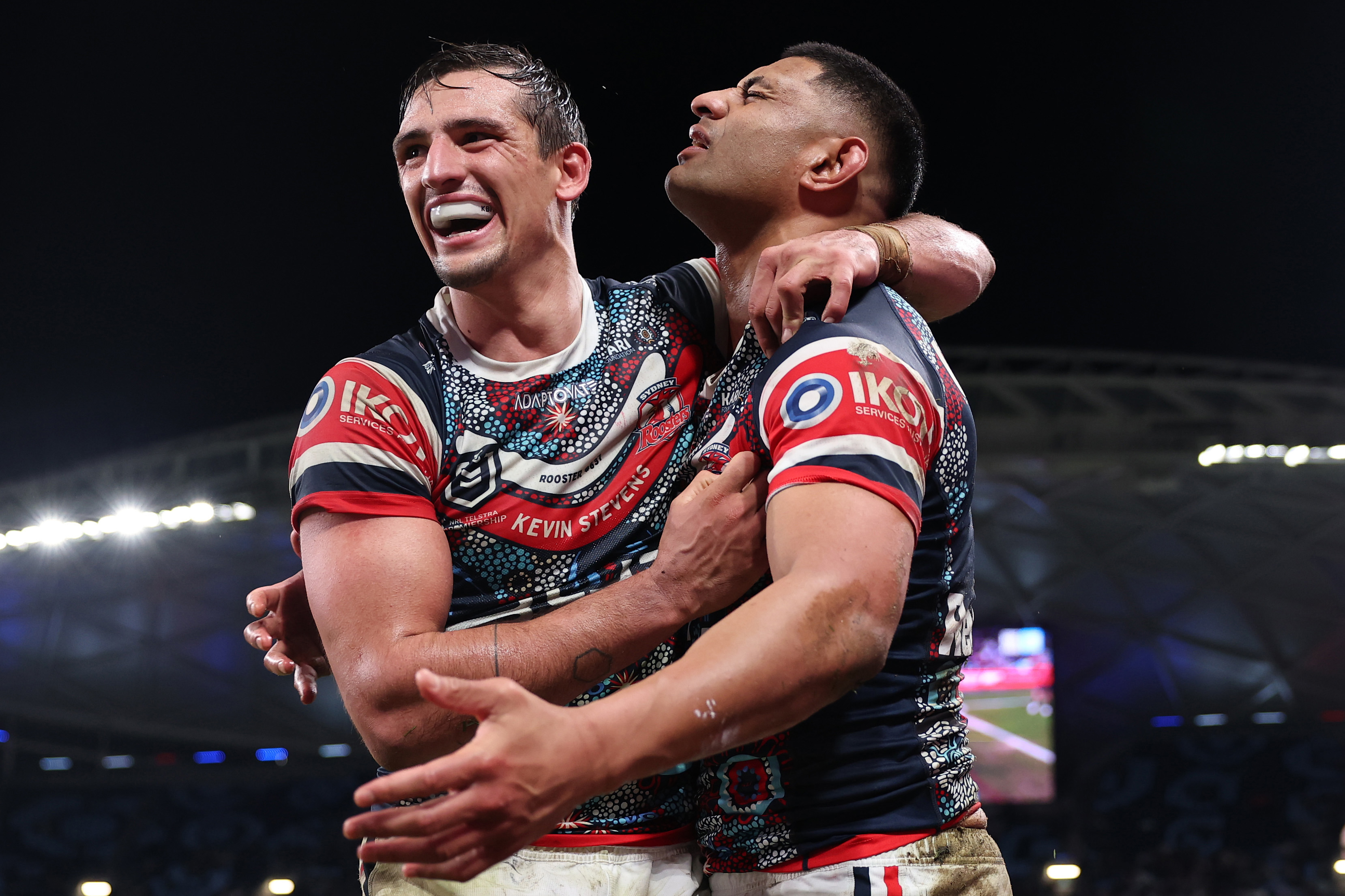 SYDNEY, AUSTRALIA - AUGUST 15: Daniel Tupou of the Roosters celebrates scoring a try with Billy Smith of the Roosters during the round 24 NRL match between Sydney Roosters and Canterbury Bulldogs at Allianz Stadium on August 15, 2025 in Sydney, Australia. (Photo by Cameron Spencer/Getty Images)