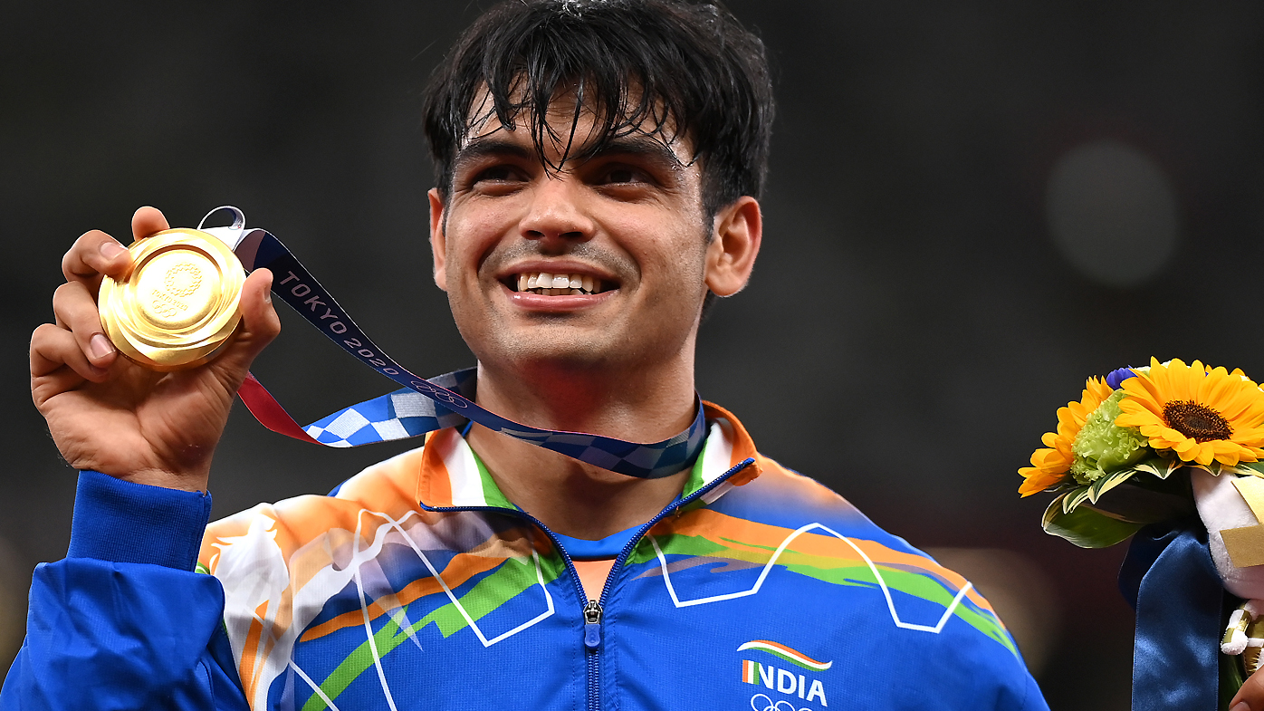 Gold medalist Neeraj Chopra of Team India stands on the podium