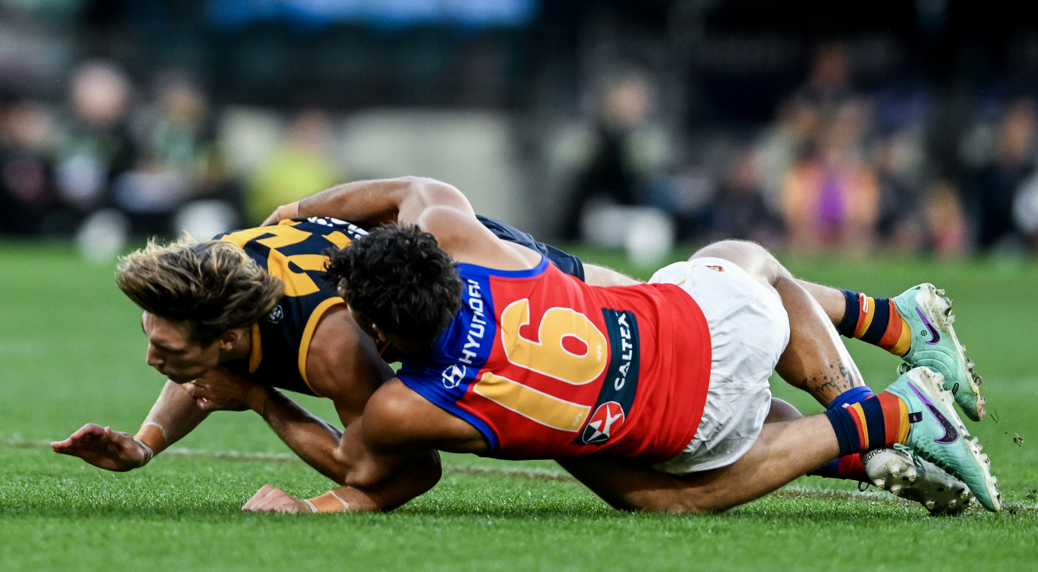 Rayner's tackle caused Worrell's wrist to get stuck awkwardly underneath the pair.