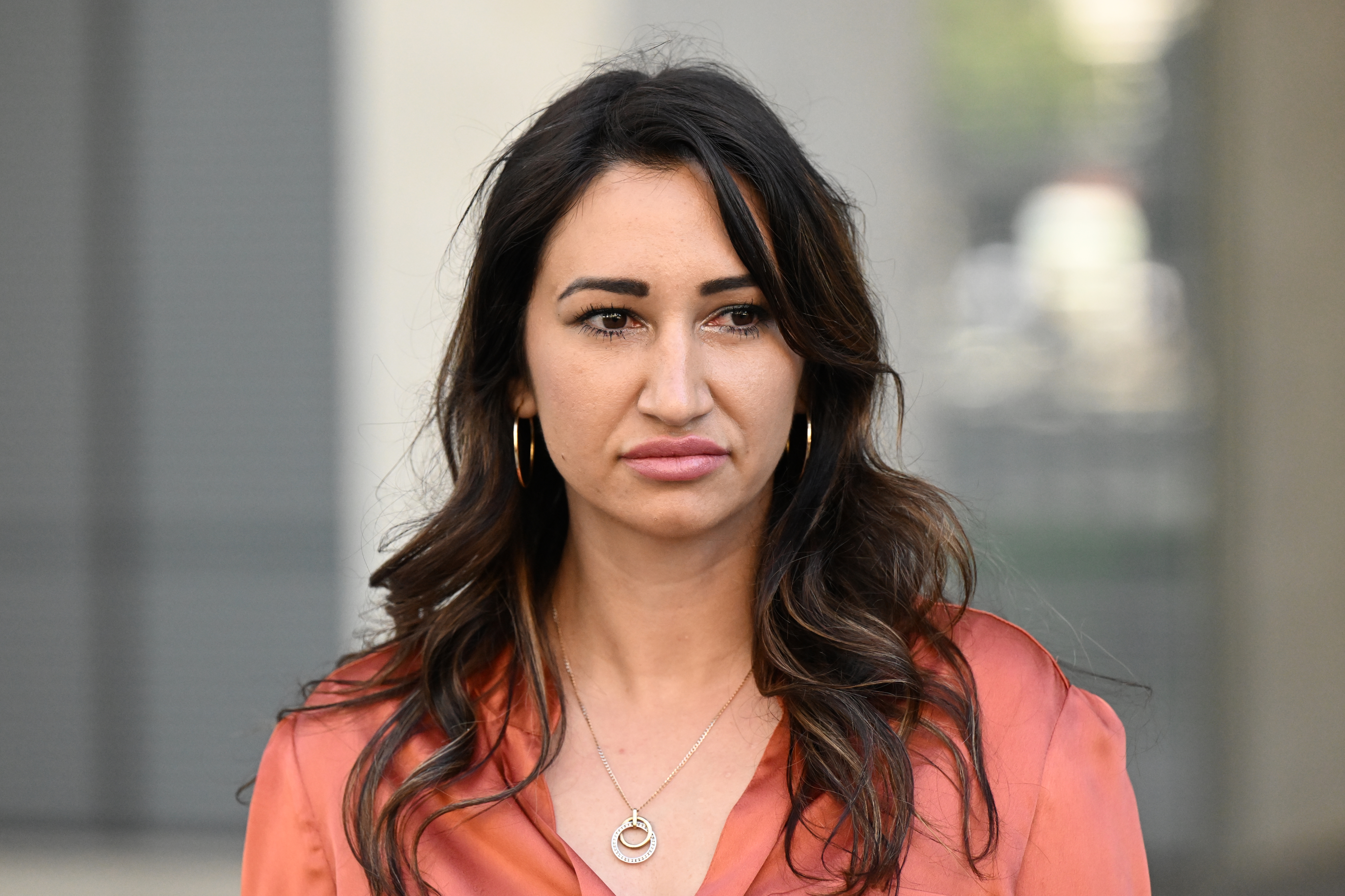 Victim Maria Buci is seen outside the Brisbane Supreme Court in Brisbane, Thursday, May 4, 2023. 