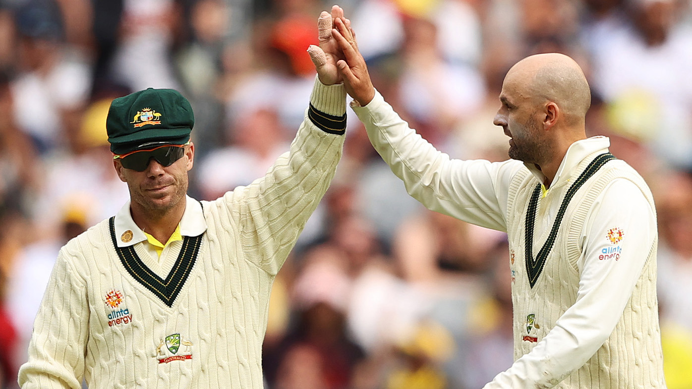 David Warner (left) and Nathan Lyon.