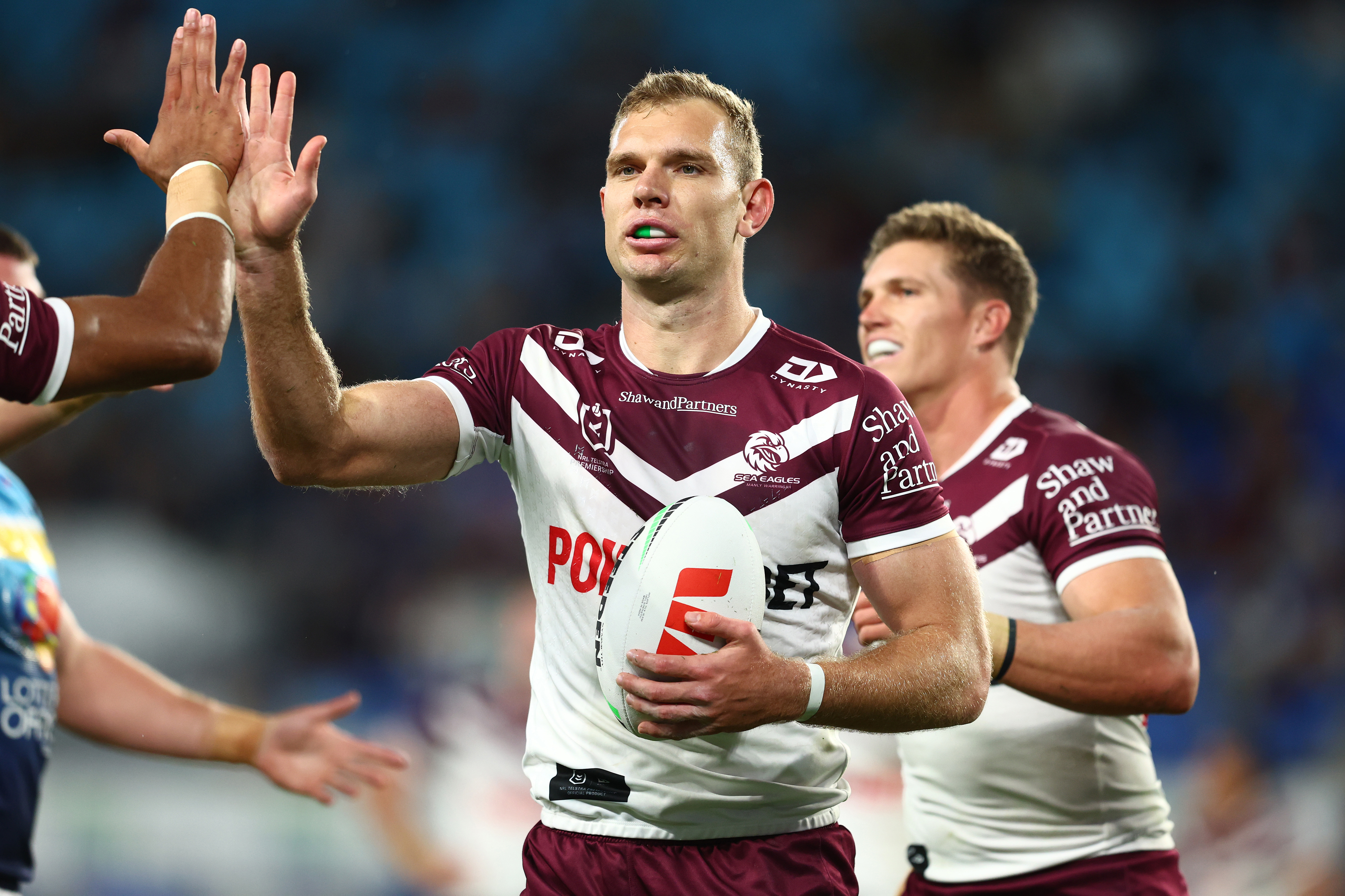Tom Trbojevic celebrates a try during the round seven NRL match between the Gold Coast Titans and the Manly Sea Eagles.