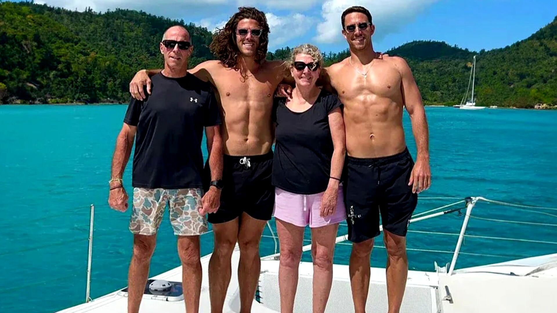 Perth men Jake and Callum Robinson were honoured in a paddle out as the community embraced the boys' heartbroken parents.